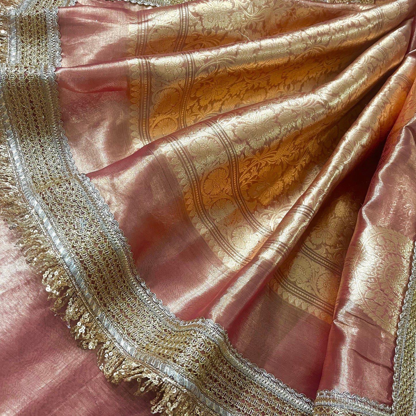 Peachish pink banarasi tissue silk saree with zari bootis and zari border