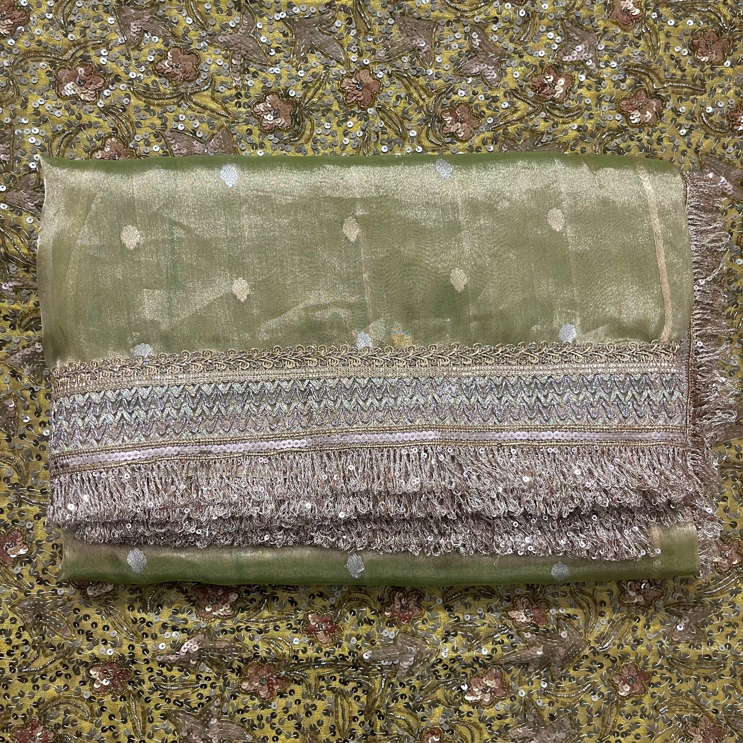 Light olive green banarasi tissue silk saree with zari bootis and zari border