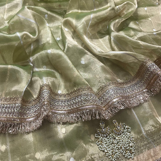 Light olive green banarasi tissue silk saree with zari bootis and zari border