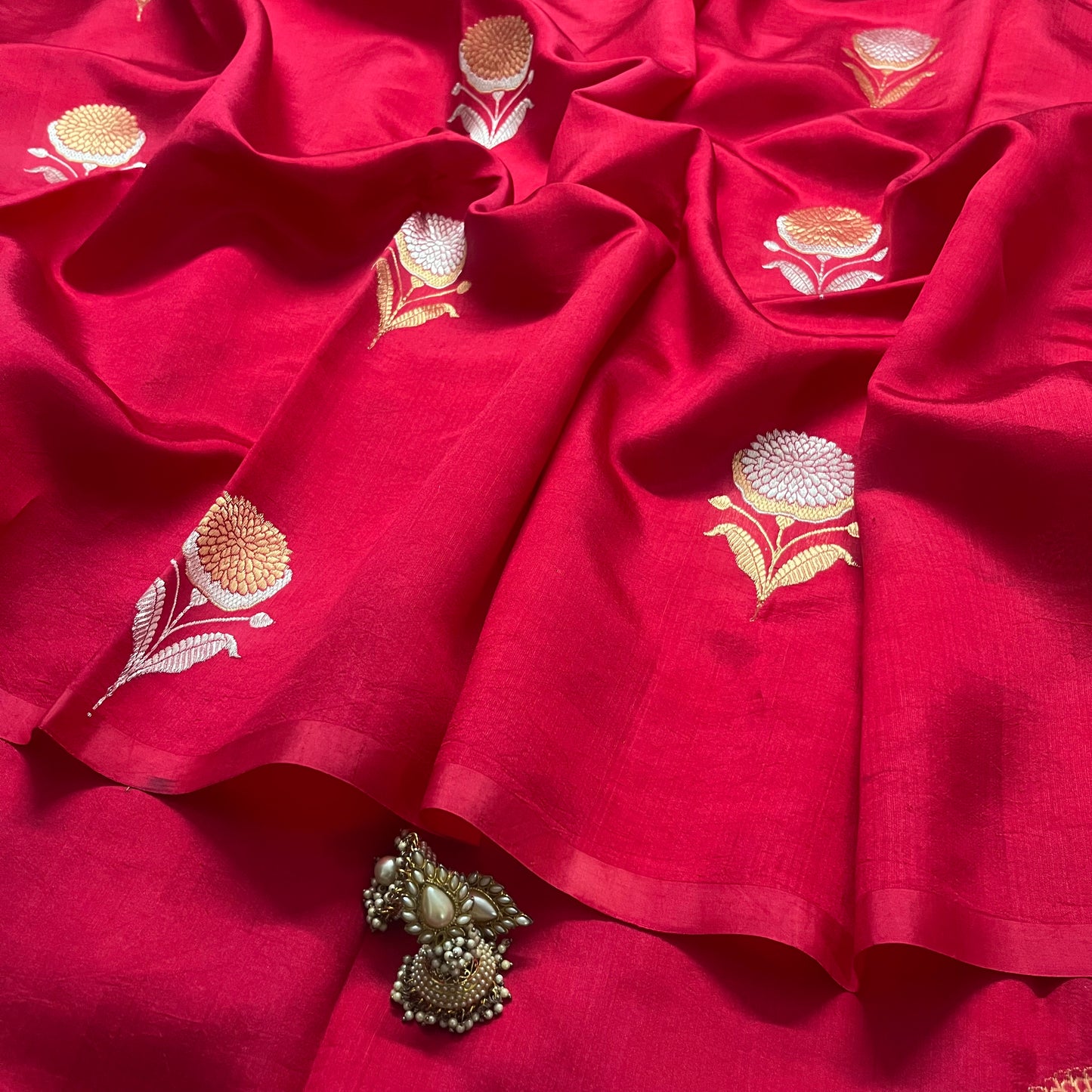 Crimson red banarasi silk saree with zari motifs all over