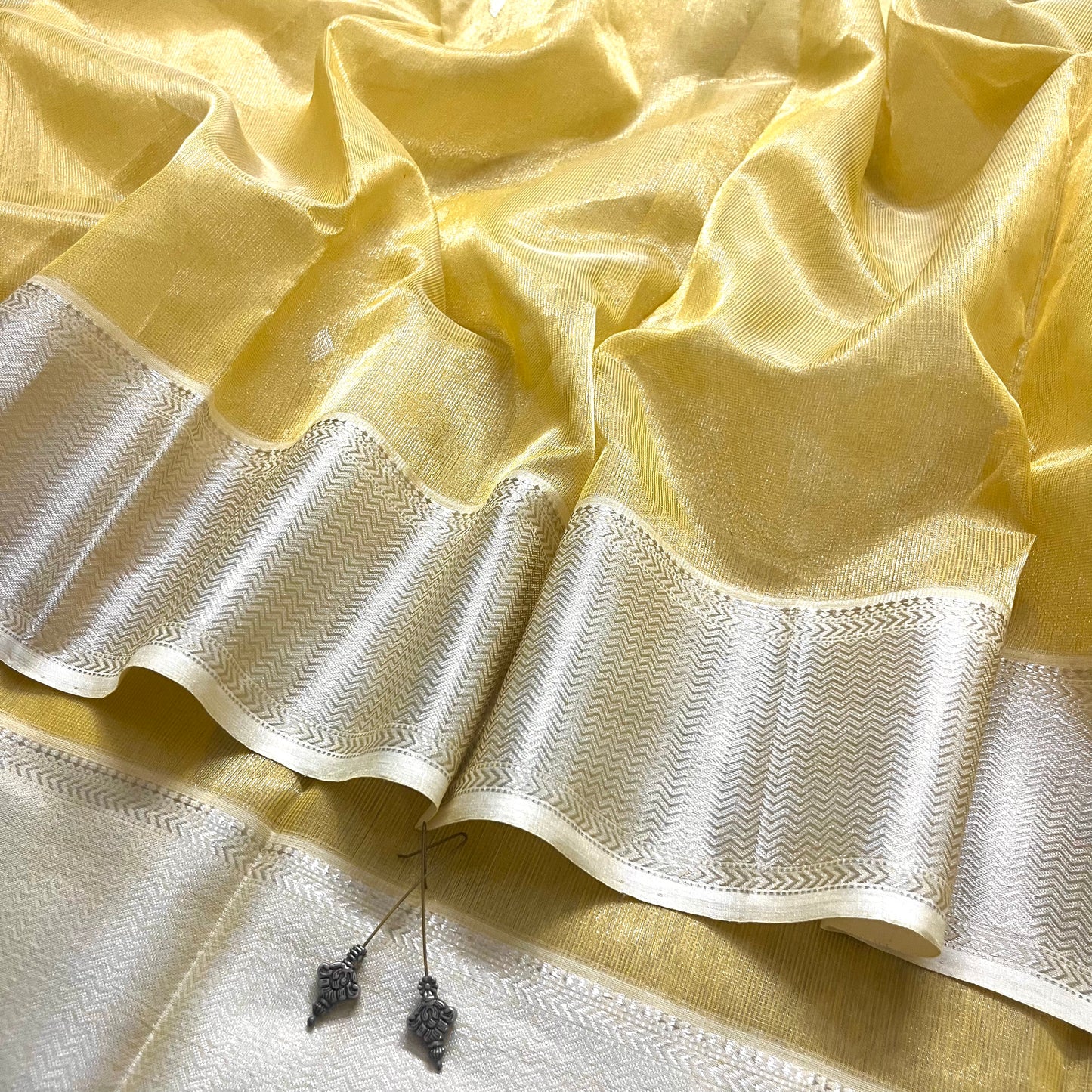 Canary yellow maheshwari tissue silk saree with zari bootis all over