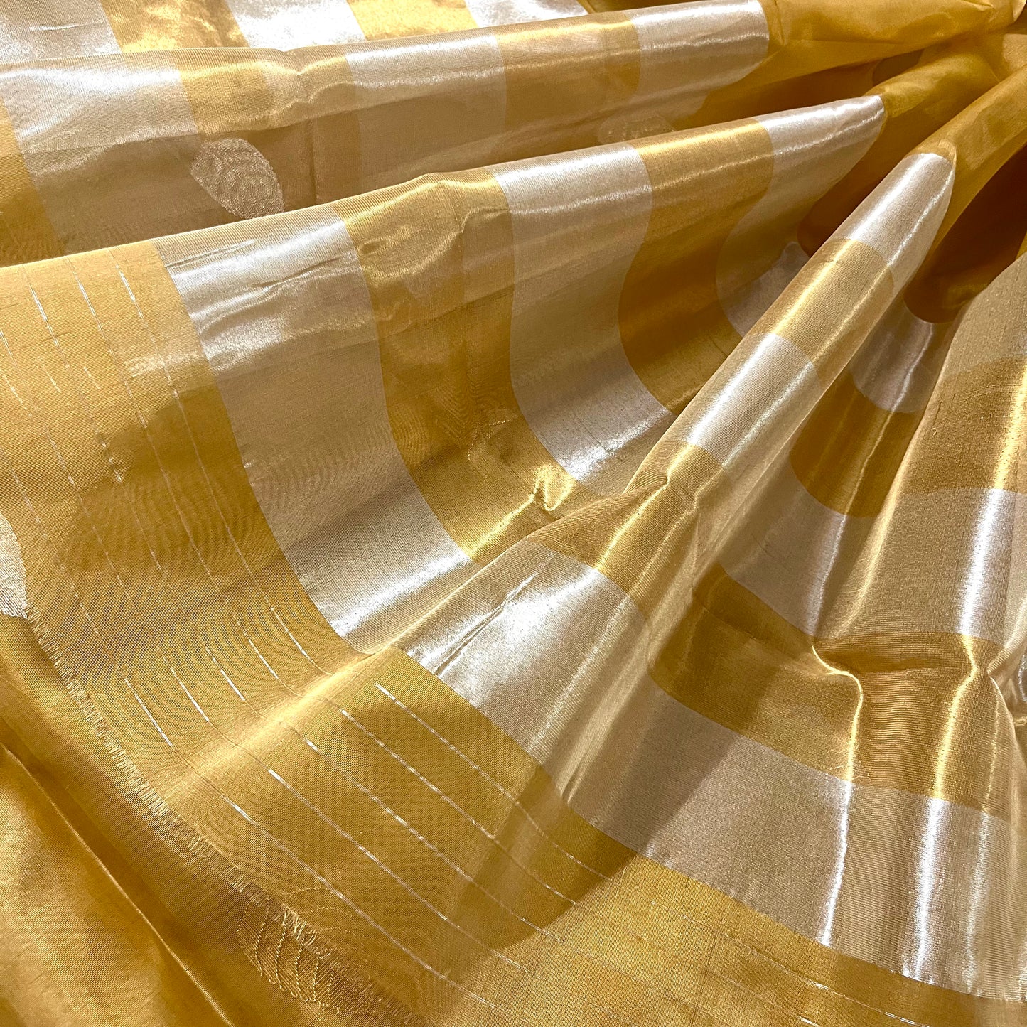 Gold chanderi silk saree with zari motifs all over