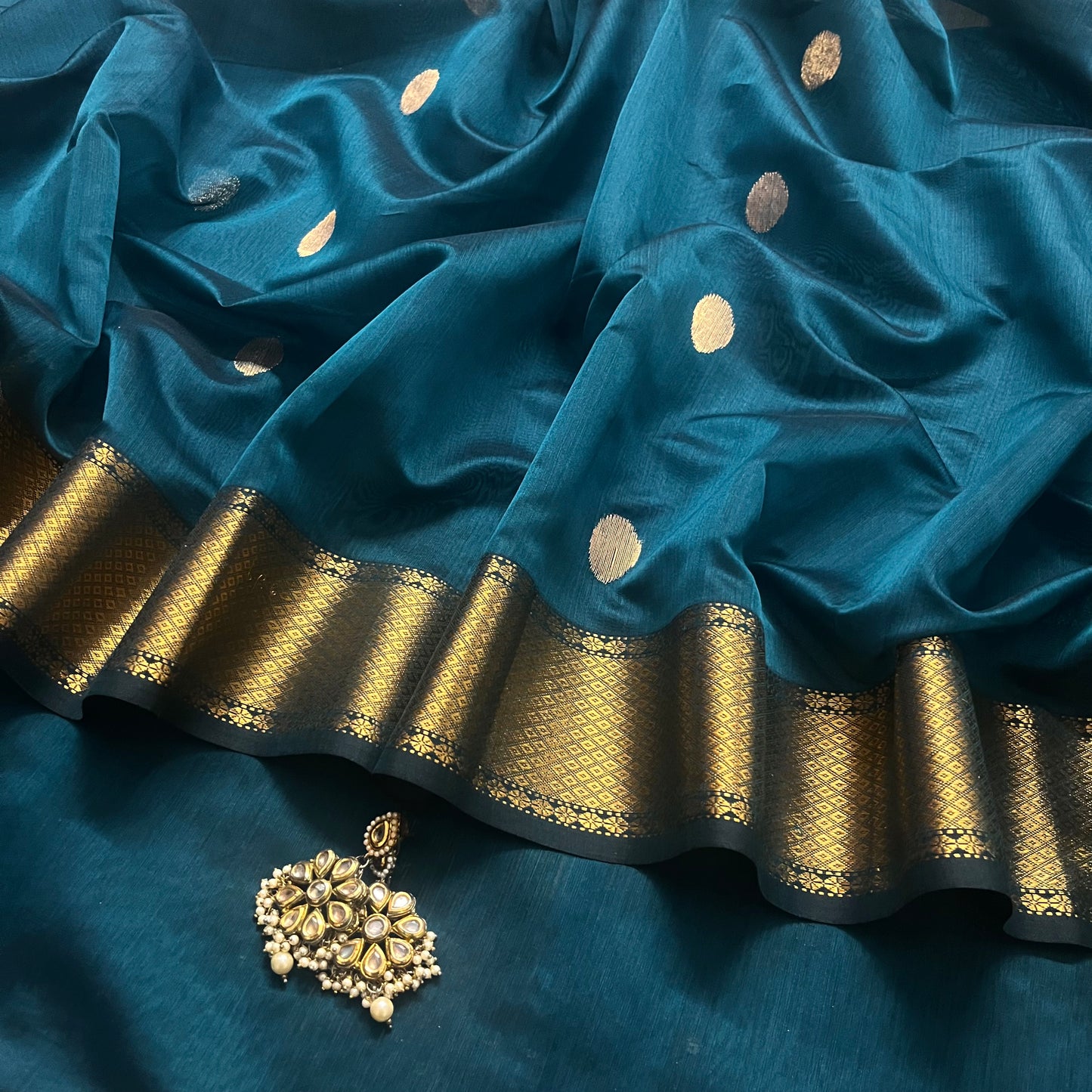 Teal maheshwari saree with zari bootis all over