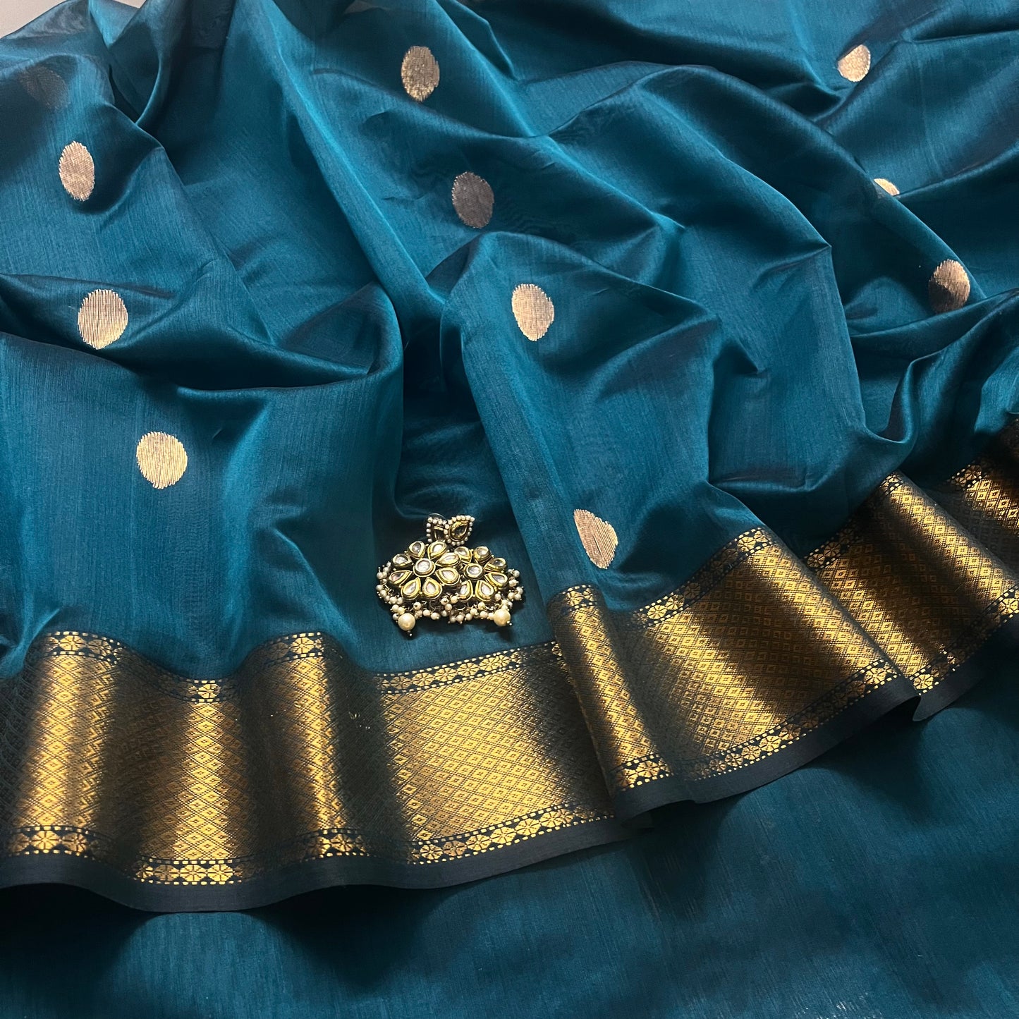 Teal maheshwari saree with zari bootis all over