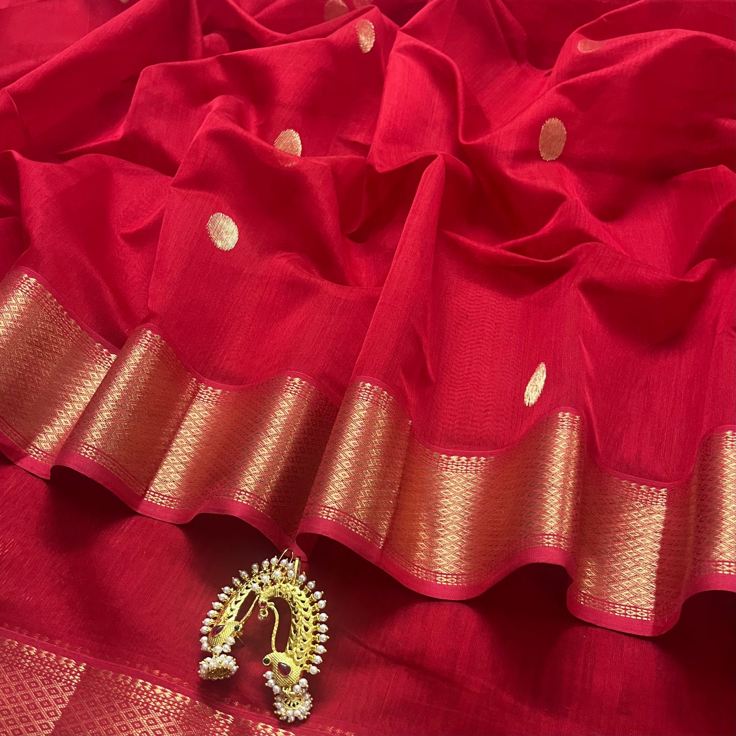 Red maheshwari saree with zari bootis all over