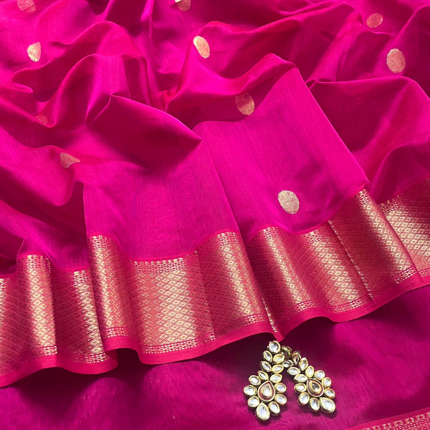 Pink maheshwari saree with zari bootis all over