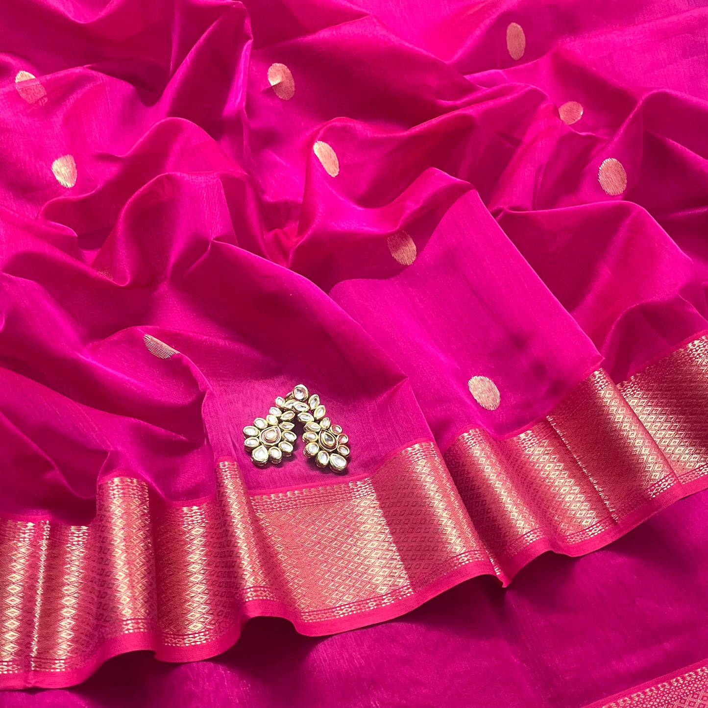 Pink maheshwari saree with zari bootis all over