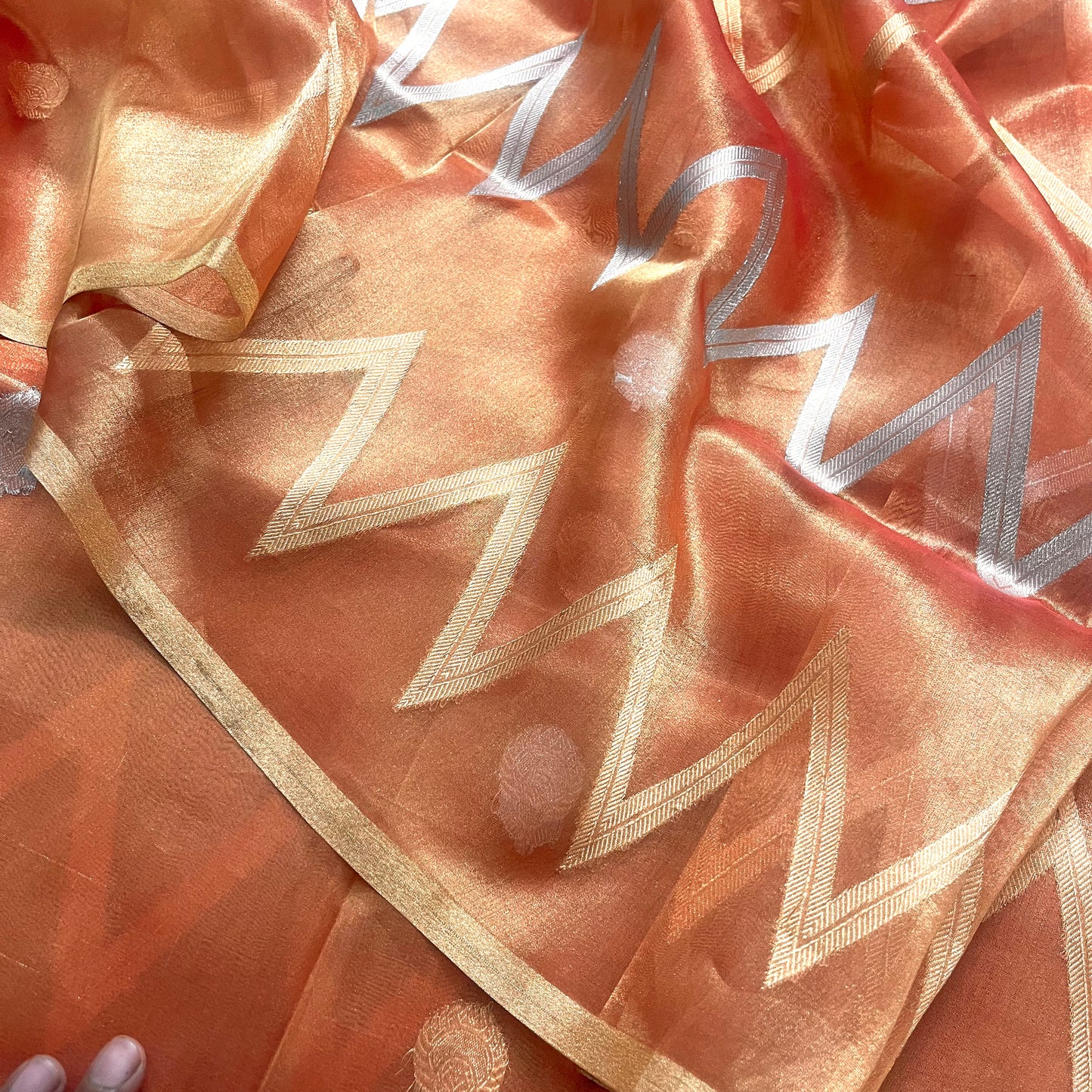 Peach banarasi tissue silk saree with zari pattern all over