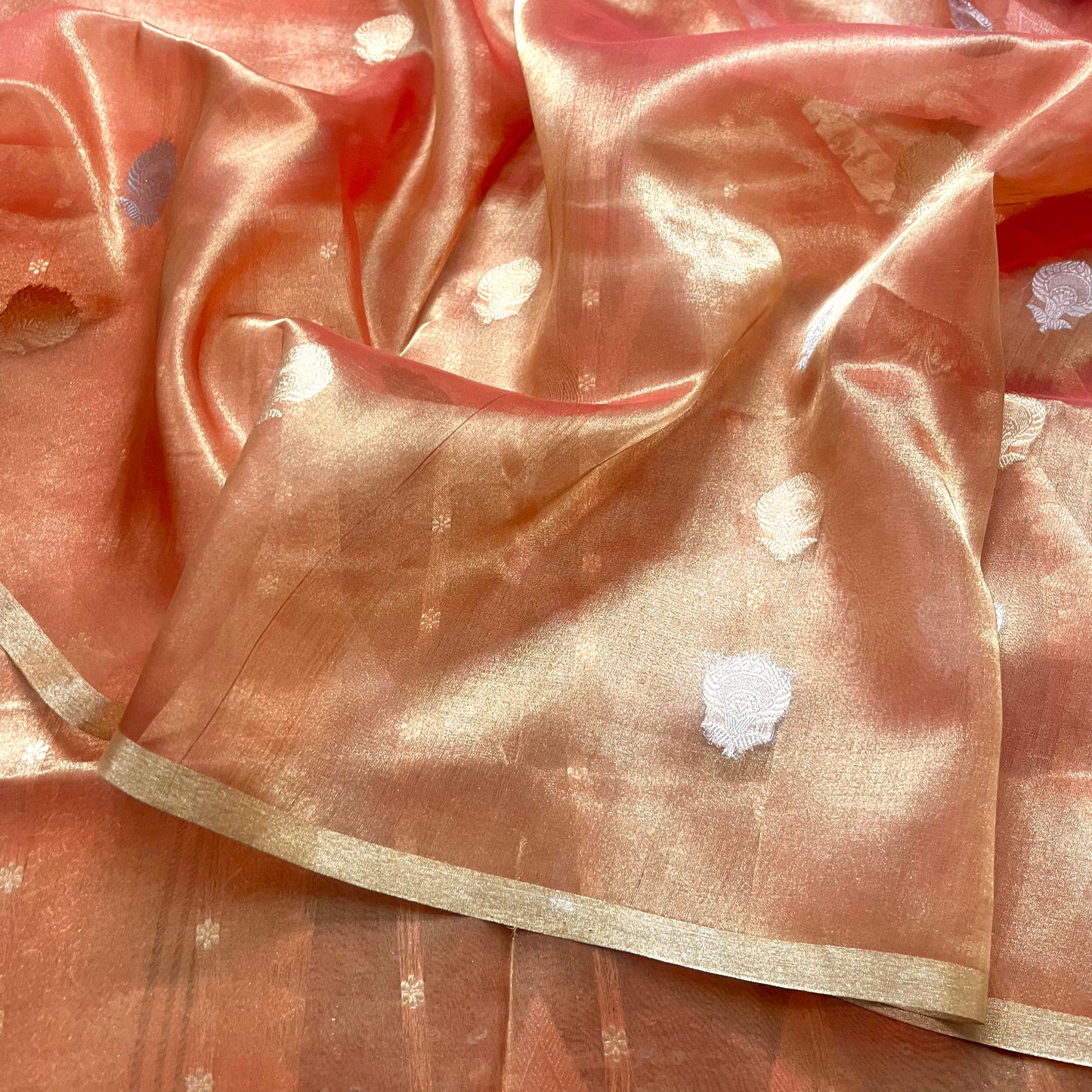 Peach banarasi tissue silk saree with zari pattern all over