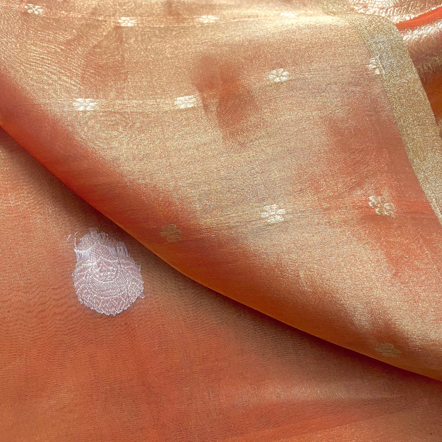 Peach banarasi tissue silk saree with zari pattern all over