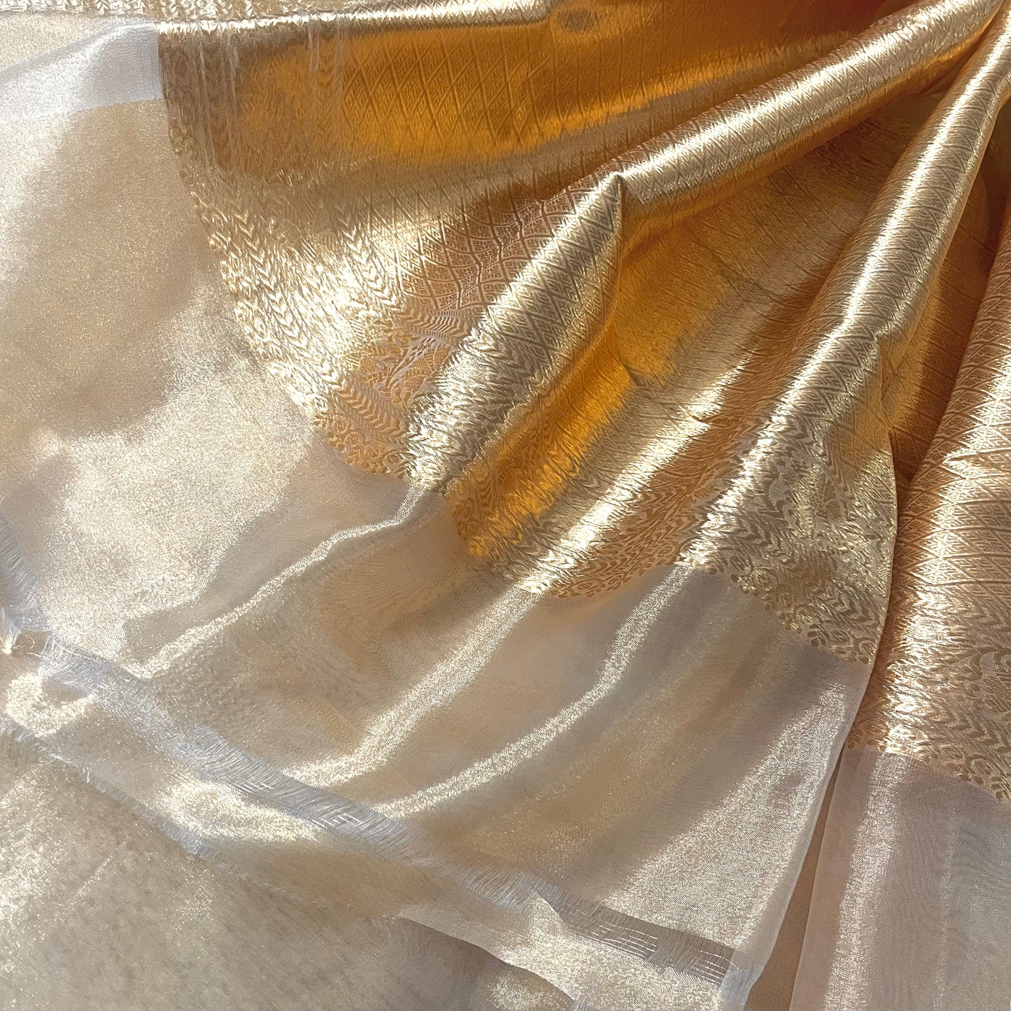 Cream gold banarasi tissue silk saree with flower motifs all over