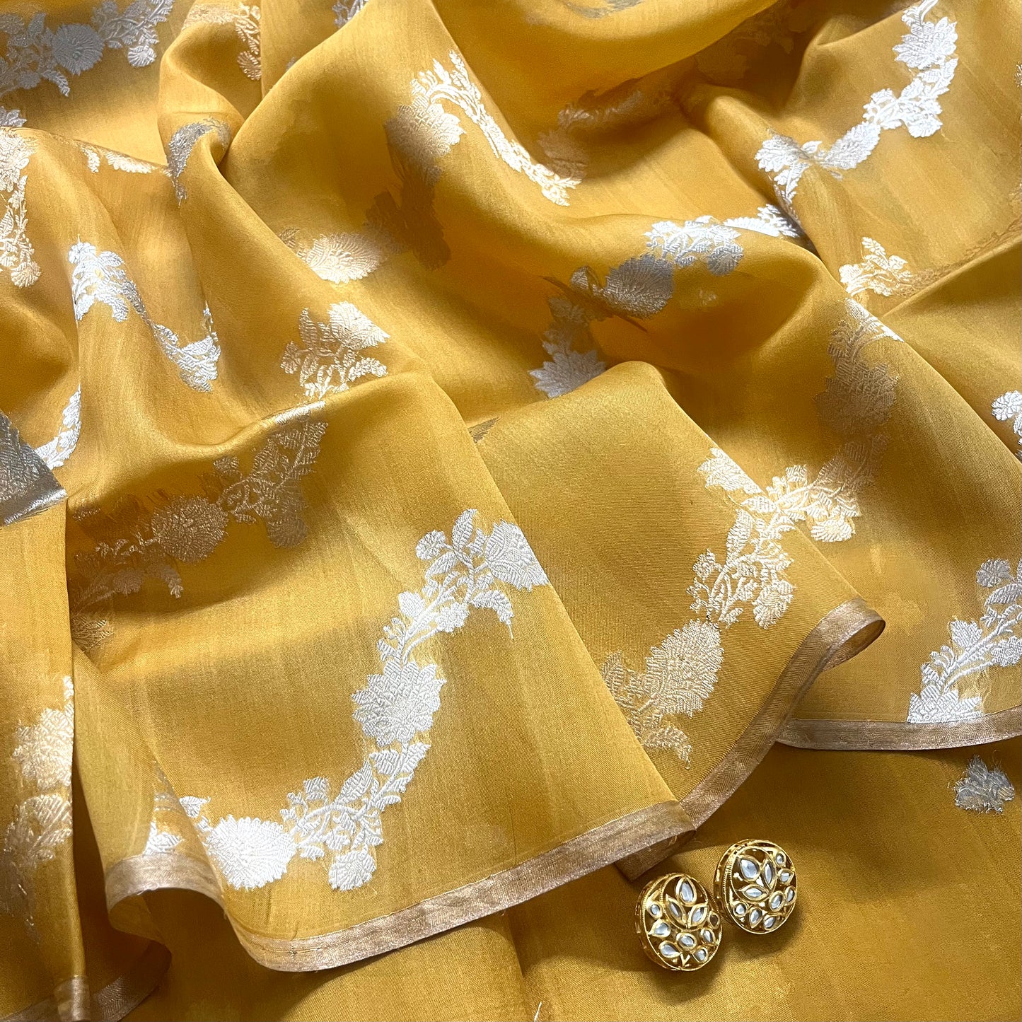 Mustard banarasi silk saree with zari bel all over