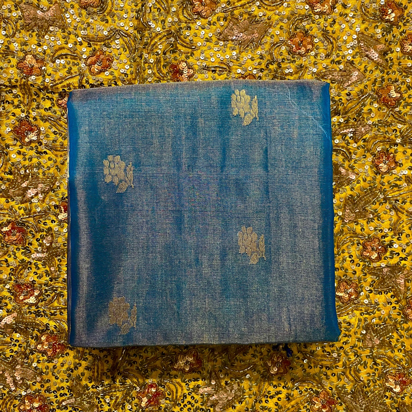 Ink blue maheshwari tissue silk saree with flower motifs all over