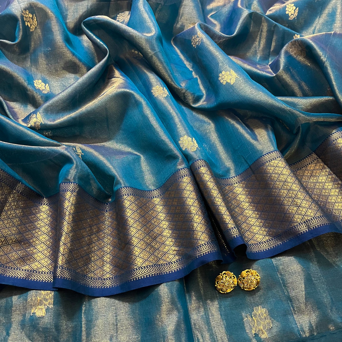 Ink blue maheshwari tissue silk saree with flower motifs all over