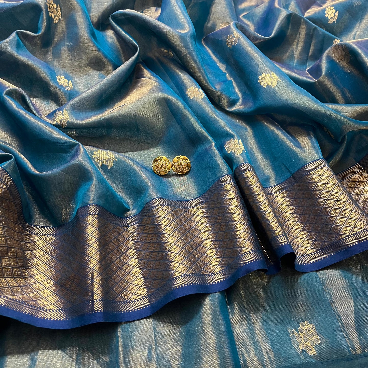 Ink blue maheshwari tissue silk saree with flower motifs all over