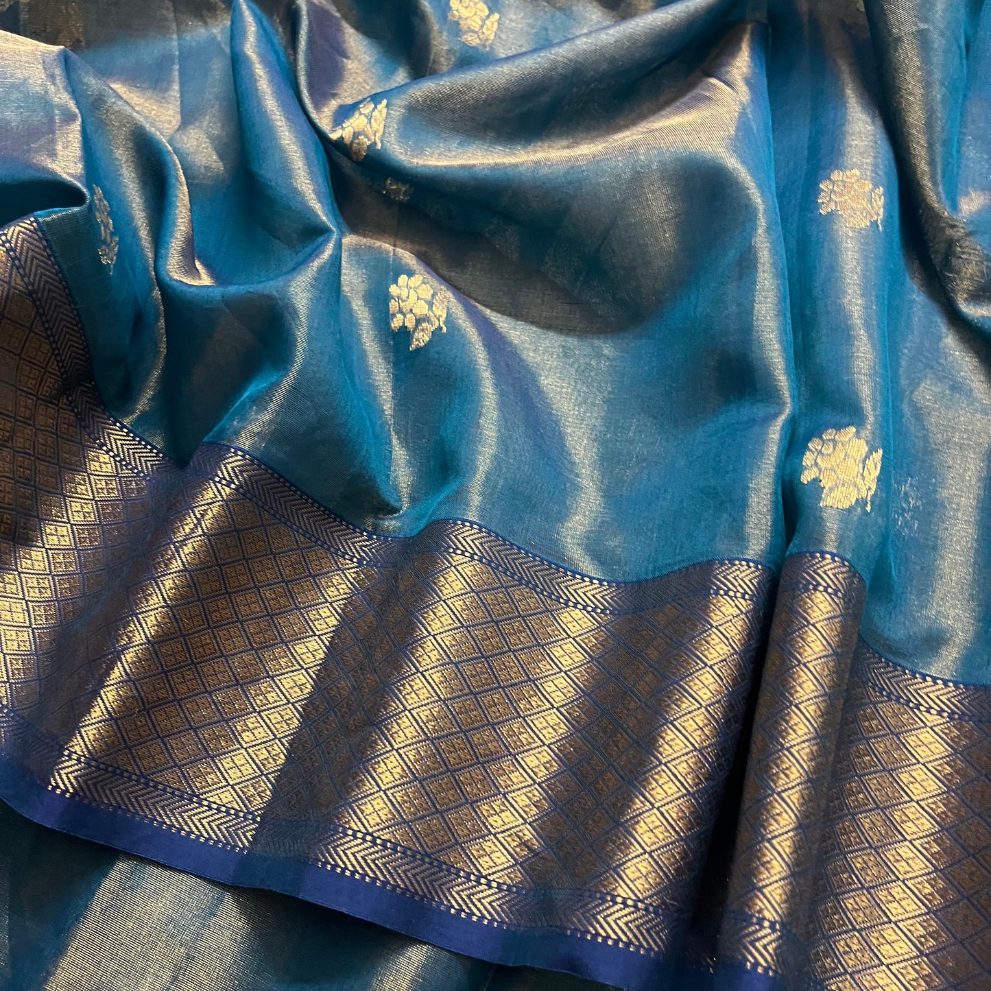 Ink blue maheshwari tissue silk saree with flower motifs all over