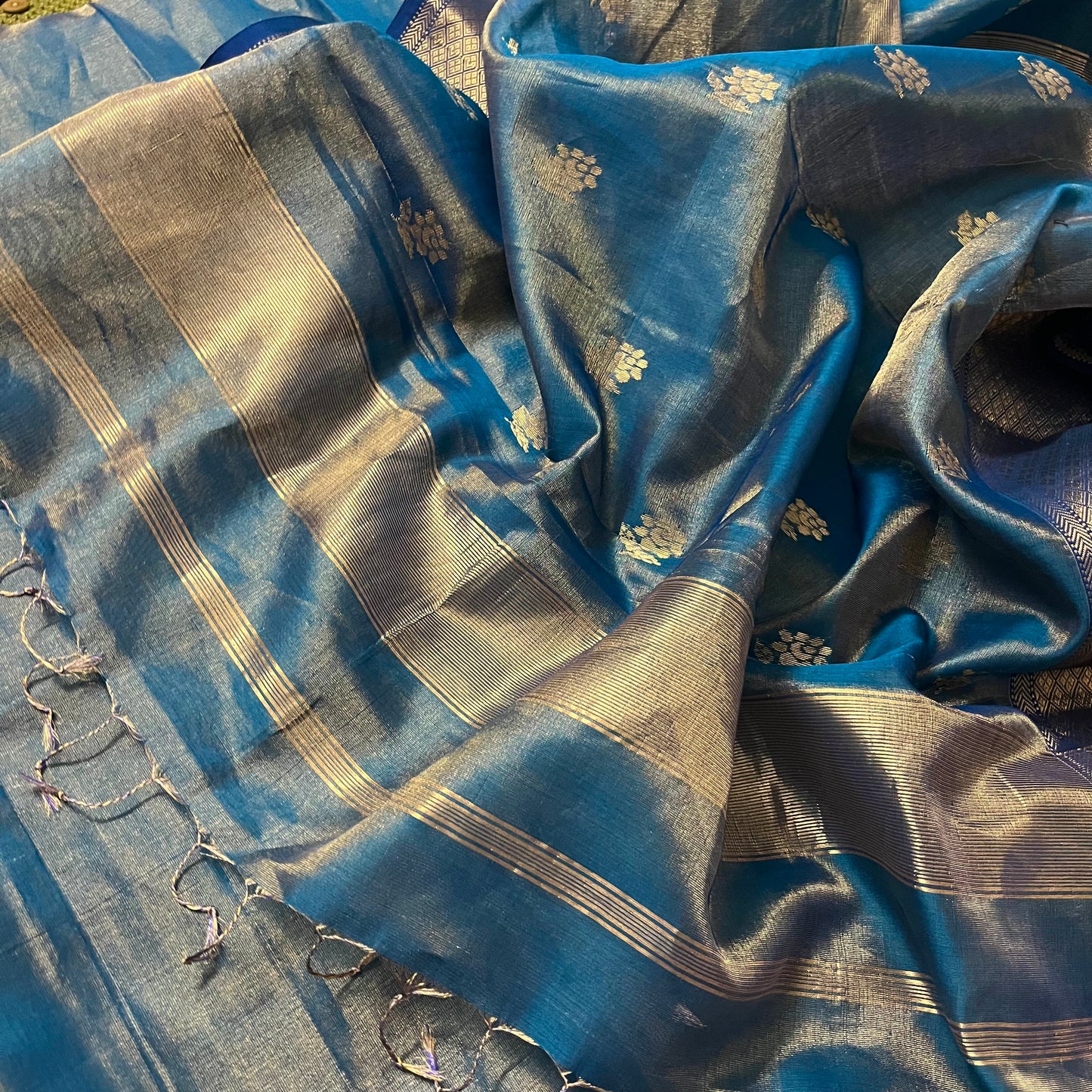 Ink blue maheshwari tissue silk saree with flower motifs all over