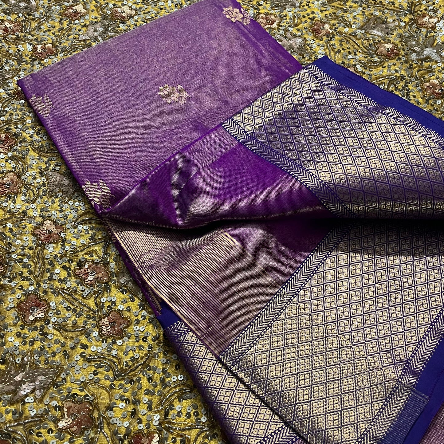 Violet maheshwari tissue silk saree with flower motifs all over