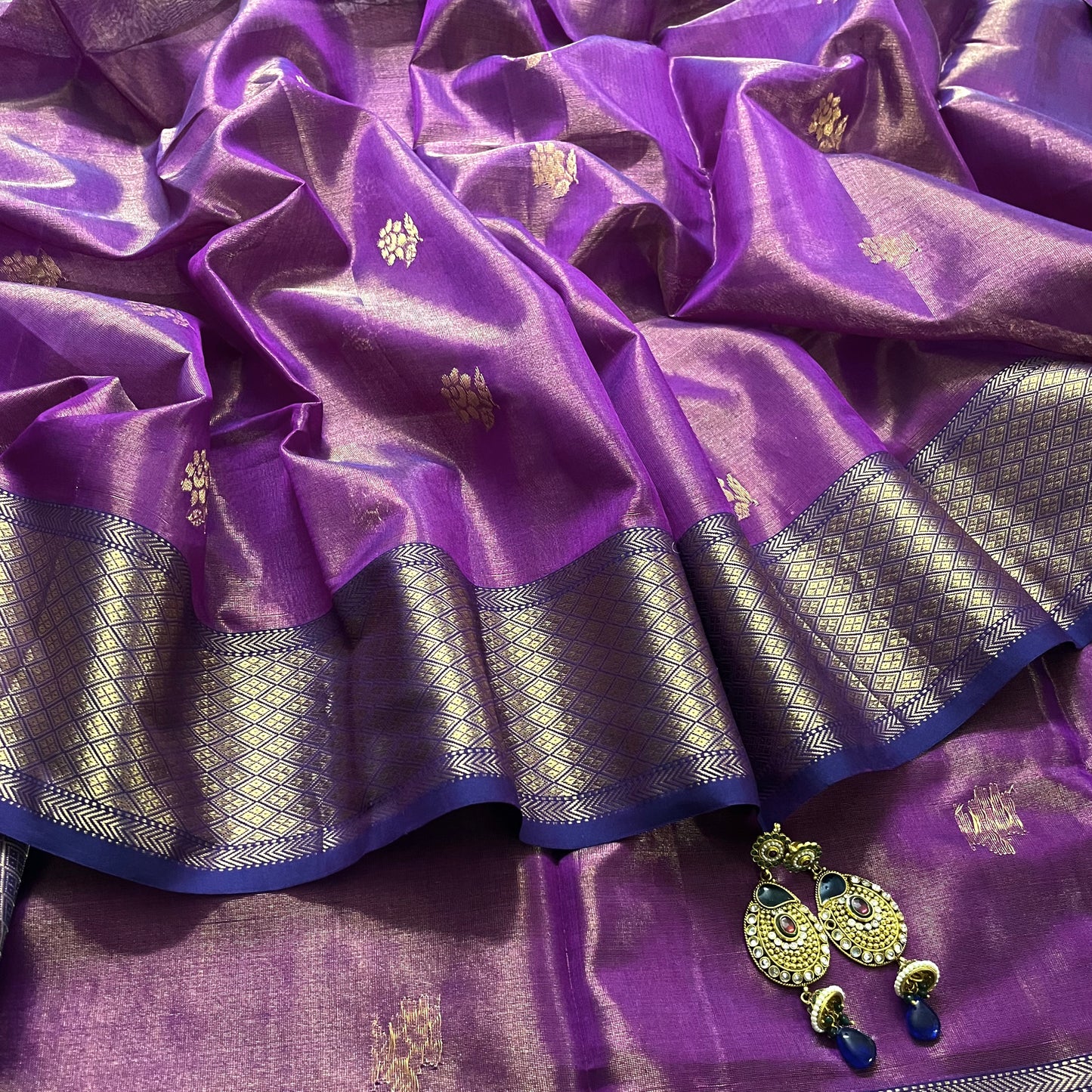 Violet maheshwari tissue silk saree with flower motifs all over