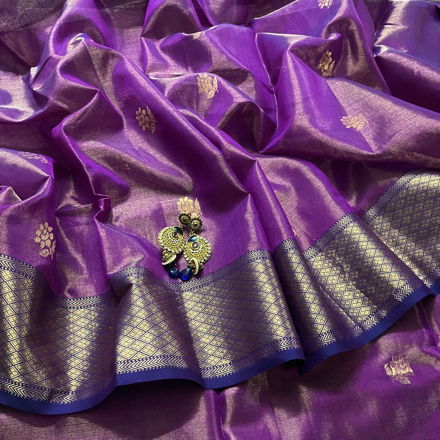 Violet maheshwari tissue silk saree with flower motifs all over