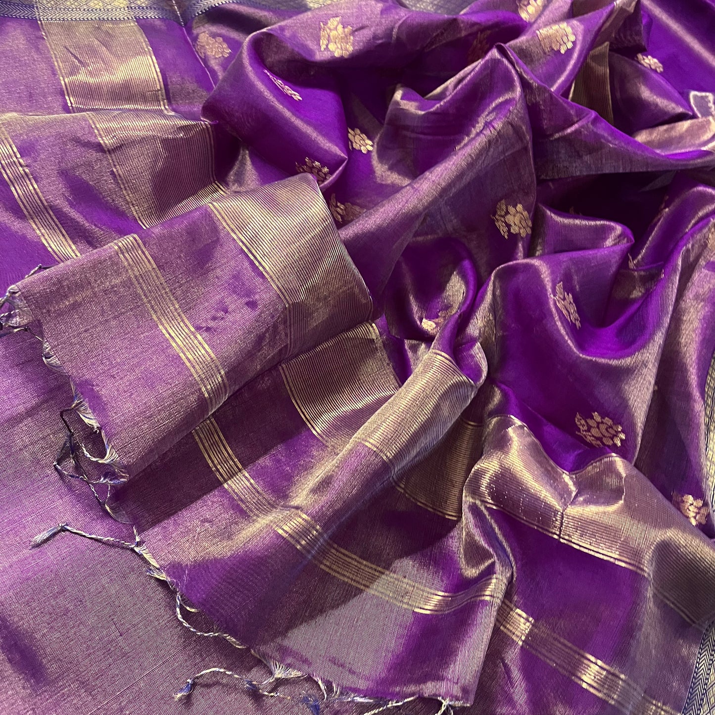 Violet maheshwari tissue silk saree with flower motifs all over