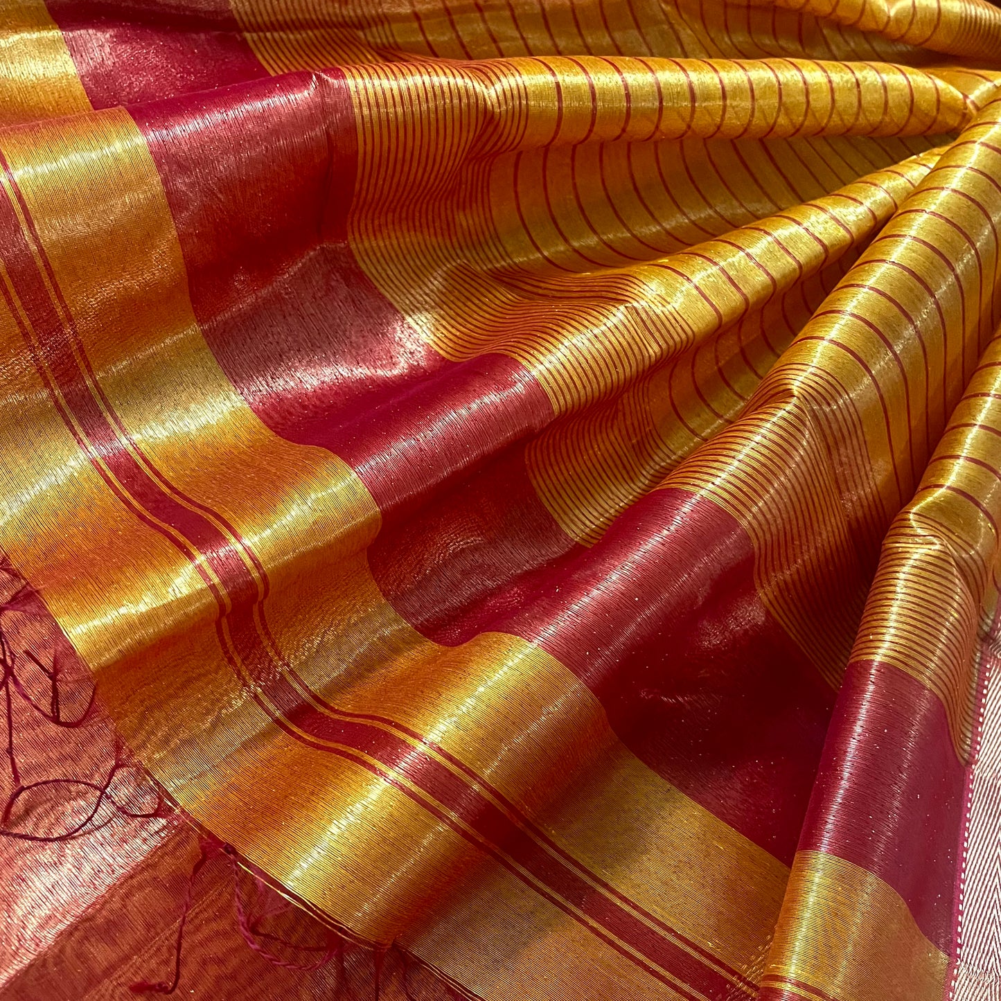 Mustard and red maheshwari tissue silk with zari pattern on pallu