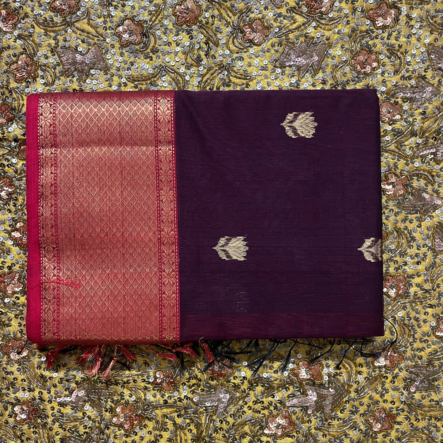 Wine and red maheshwari saree with flower motifs all over