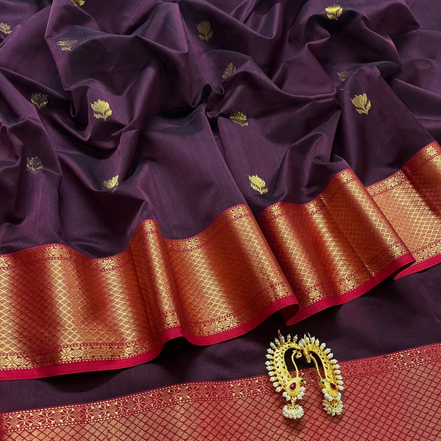 Wine and red maheshwari saree with flower motifs all over