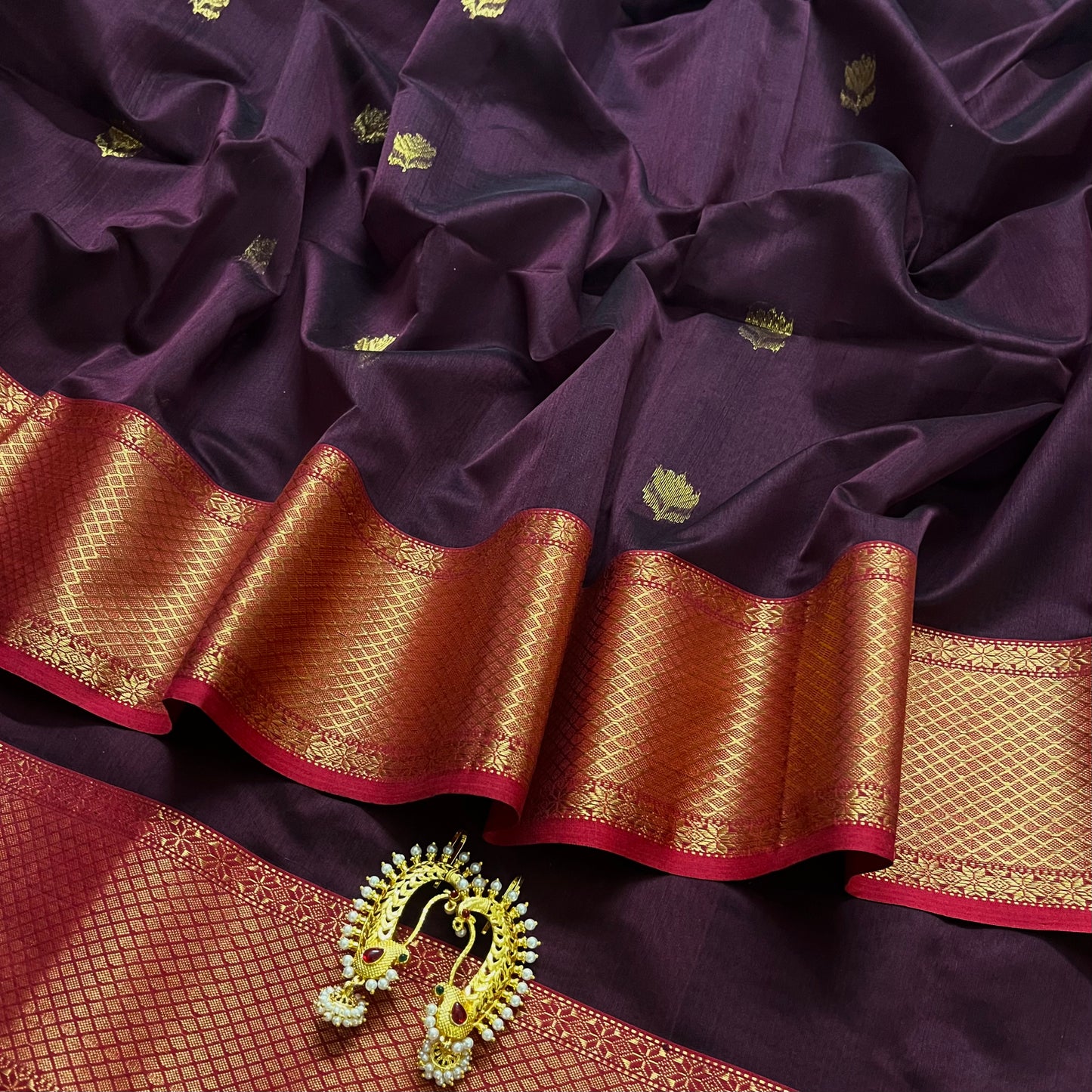 Wine and red maheshwari saree with flower motifs all over