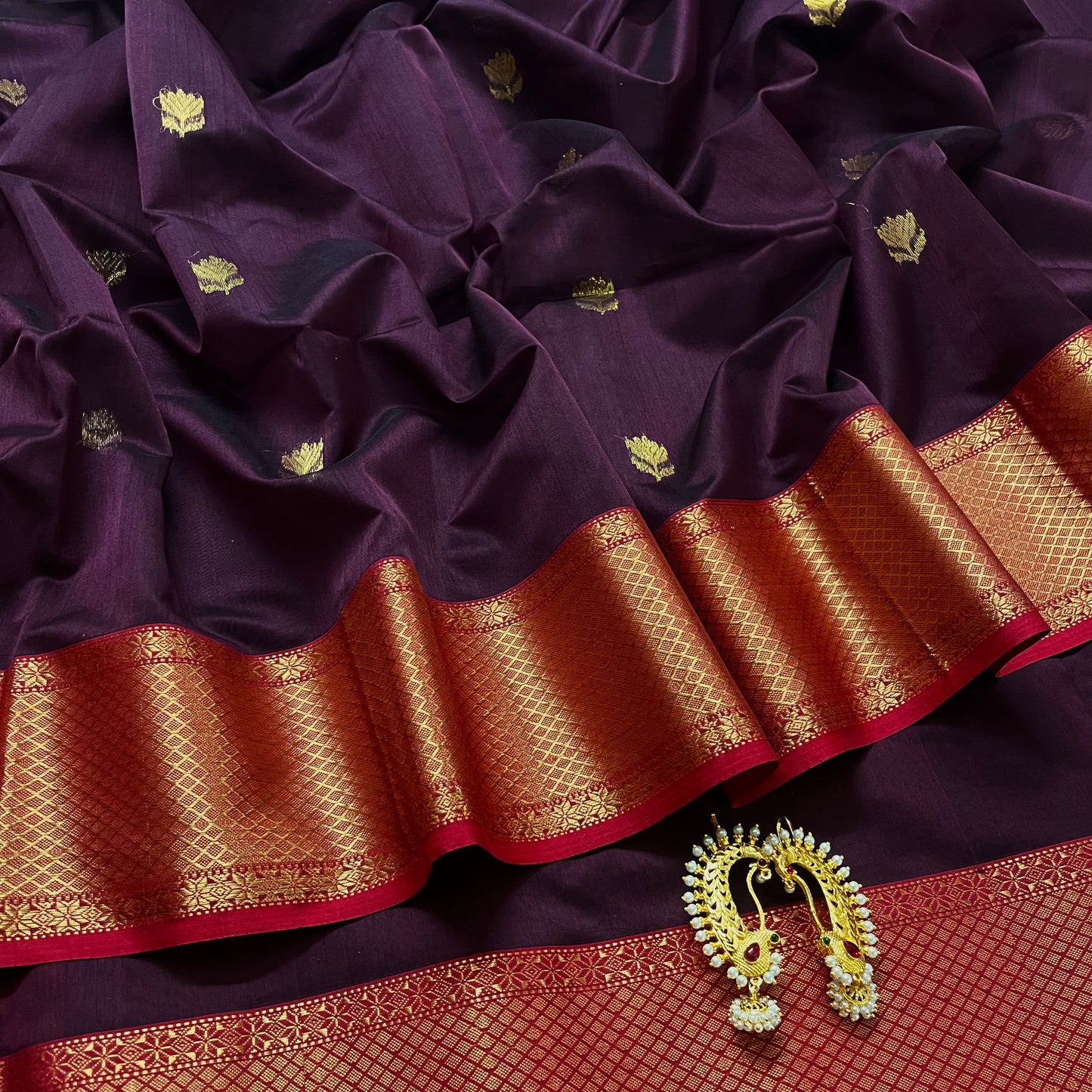 Wine and red maheshwari saree with flower motifs all over