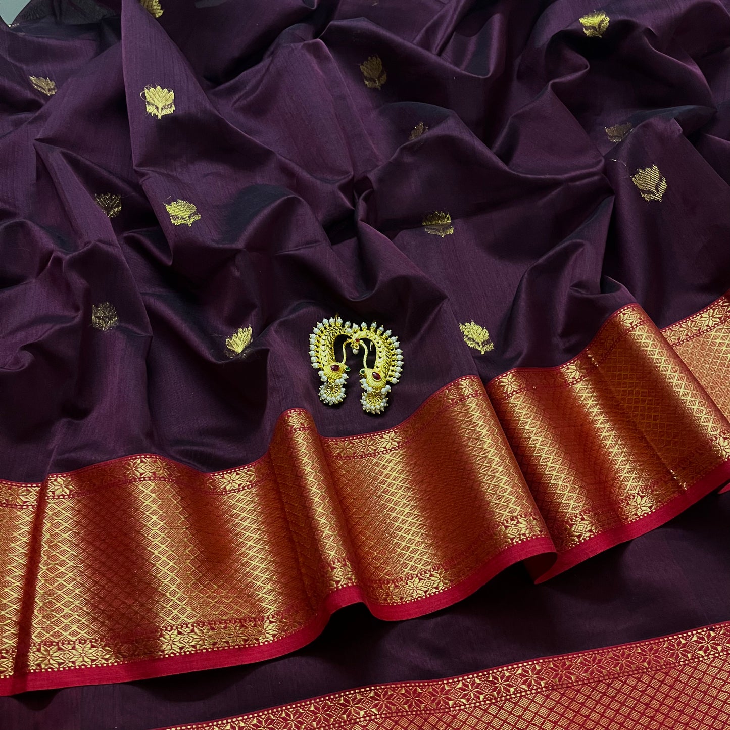 Wine and red maheshwari saree with flower motifs all over