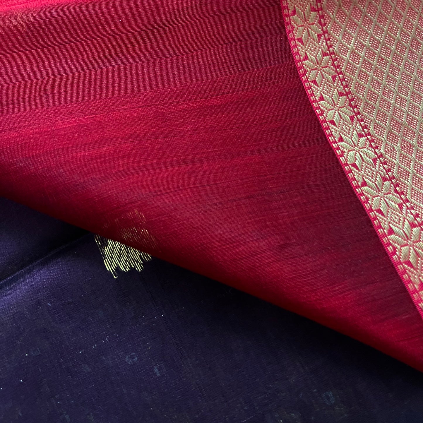 Wine and red maheshwari saree with flower motifs all over