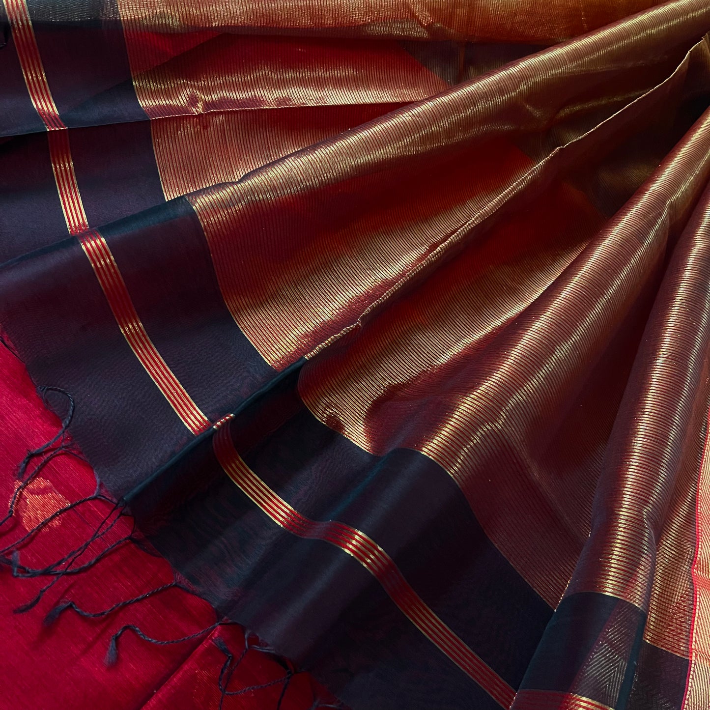 Black and red maheshwari saree with flower motifs all over