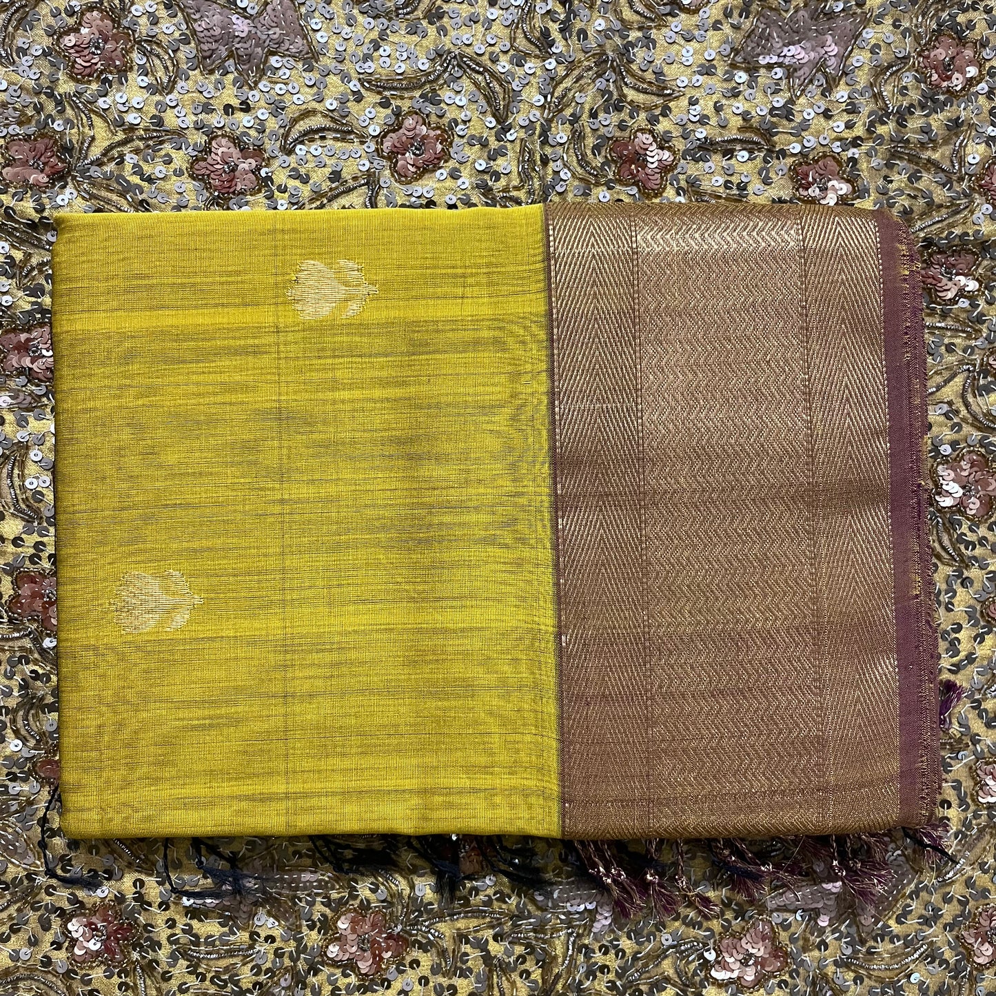 Mustard maheshwari saree with flower motifs all over