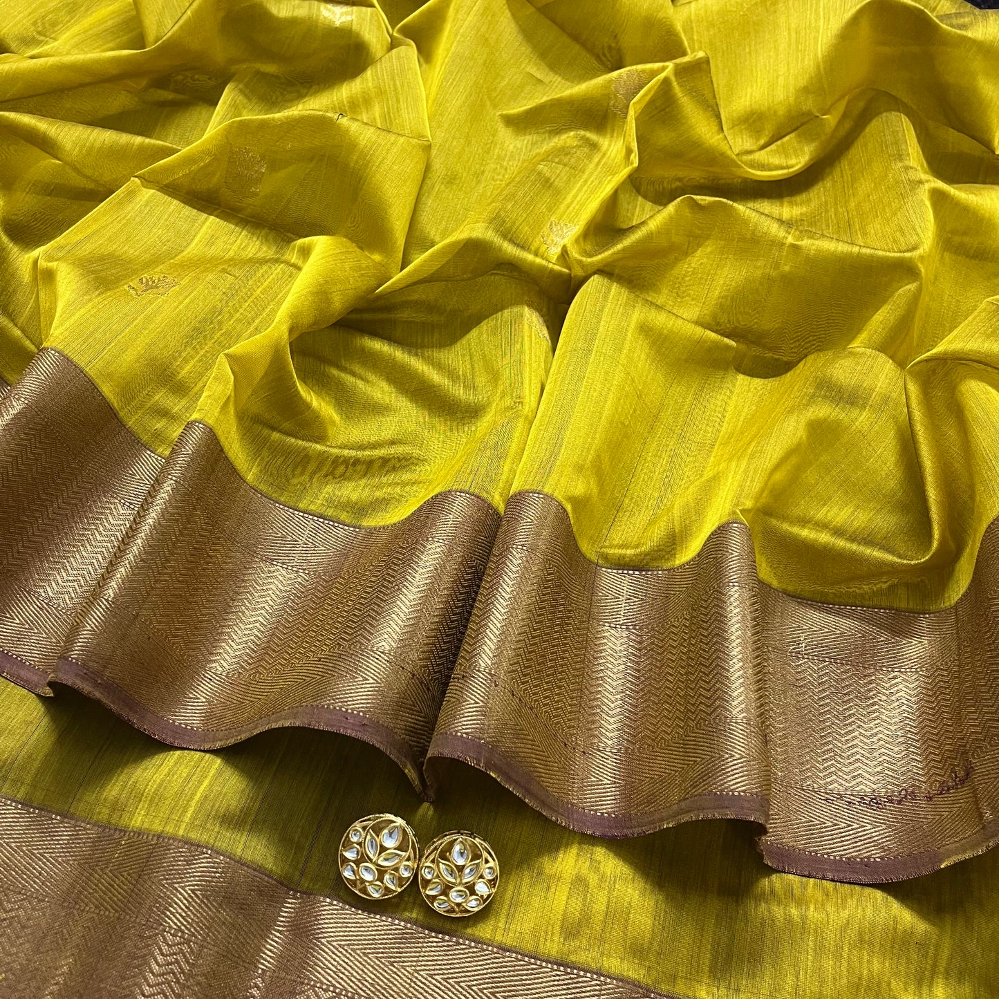 Mustard maheshwari saree with flower motifs all over