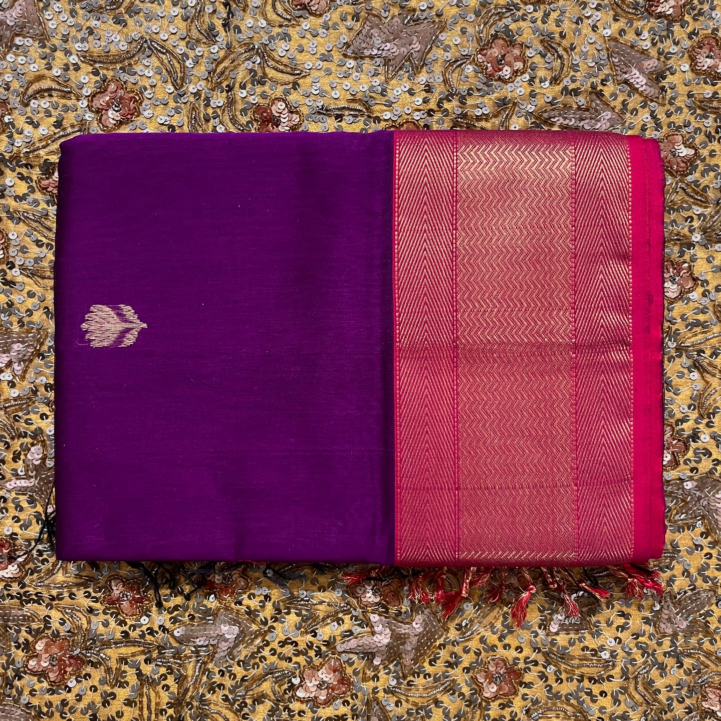 Violet and red maheshwari saree with flower motifs all over