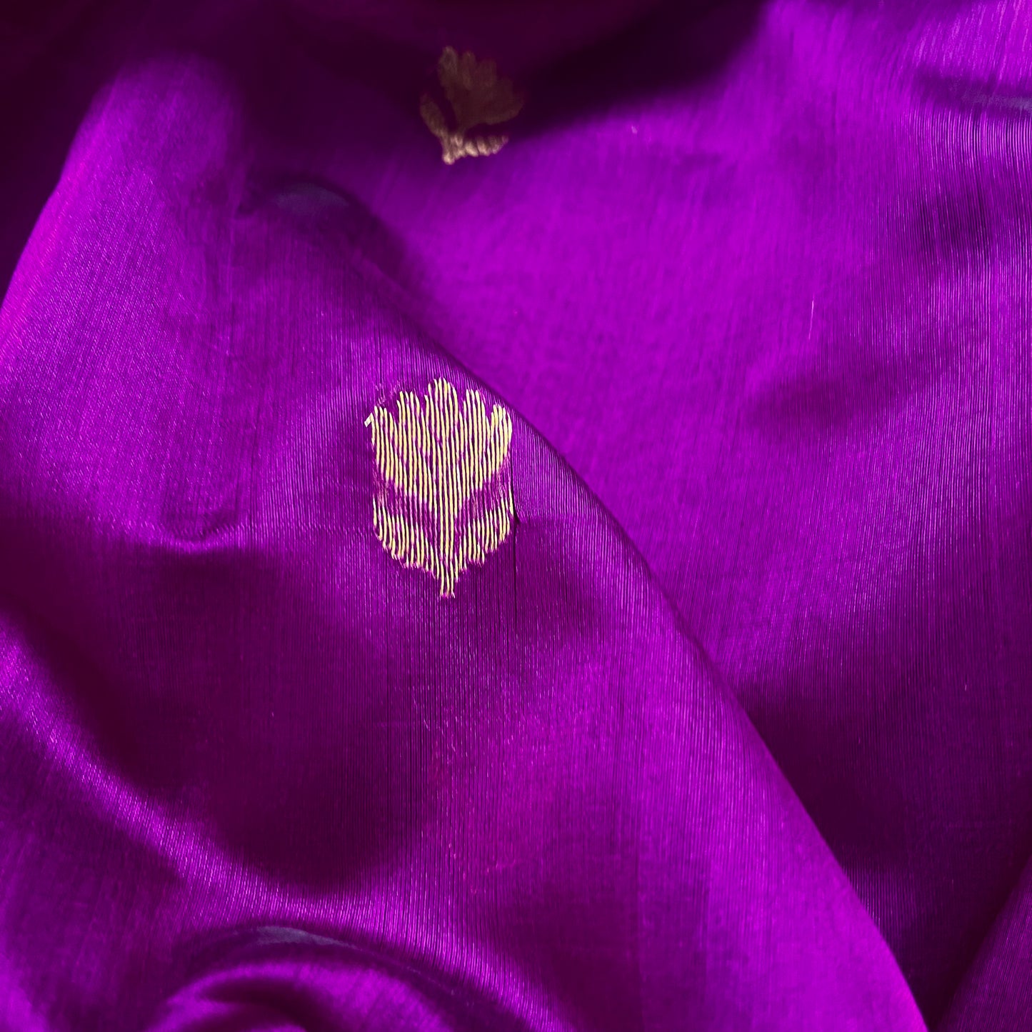 Violet and red maheshwari saree with flower motifs all over