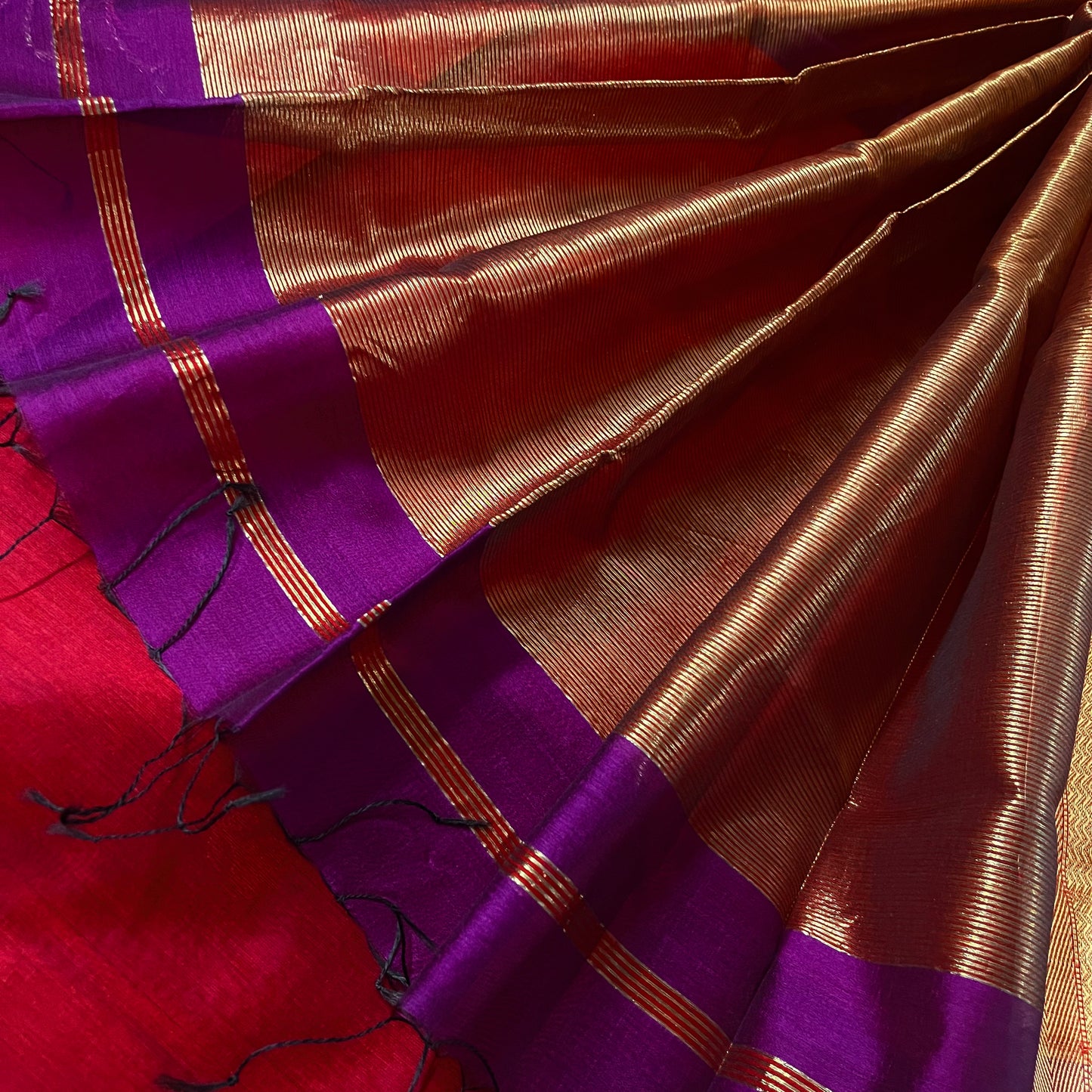 Violet and red maheshwari saree with flower motifs all over