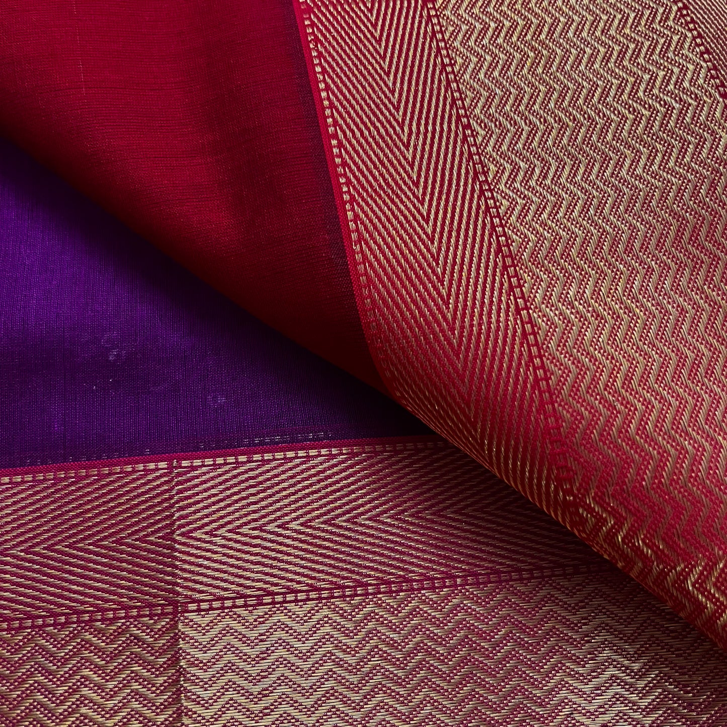 Violet and red maheshwari saree with flower motifs all over