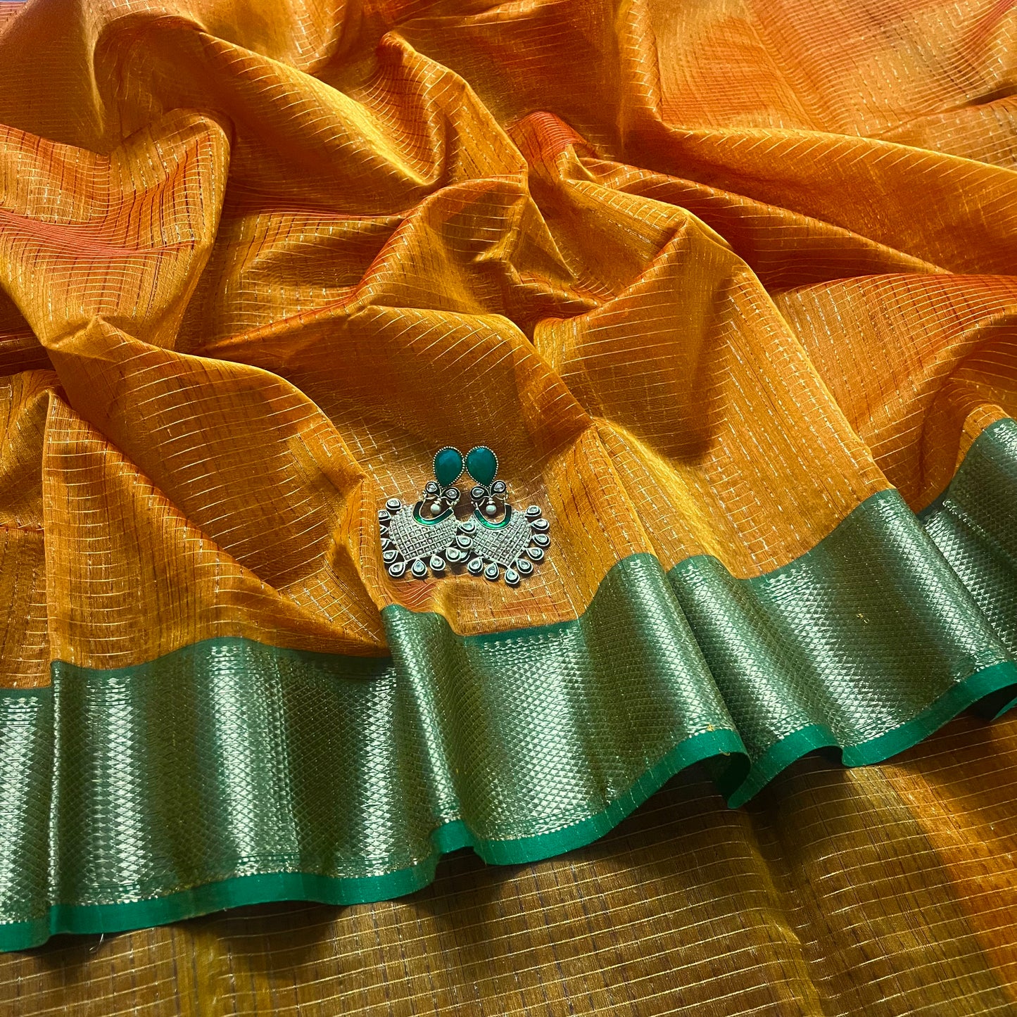 Rust and green maheshwari saree with zari checks all over