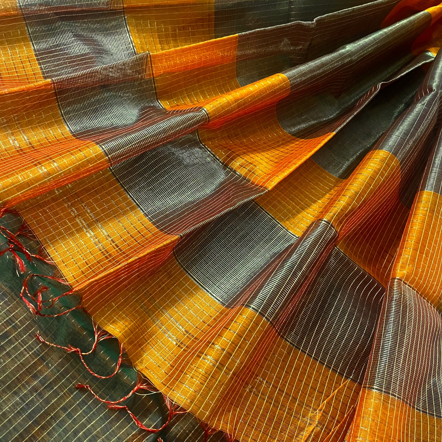 Rust and green maheshwari saree with zari checks all over