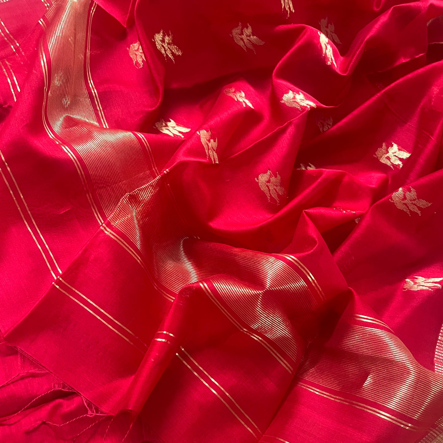 Red maheshwari saree with flower motifs on pallu