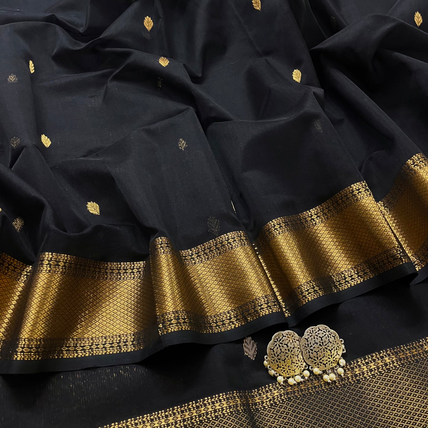 Black maheshwari saree with zari bootis all over