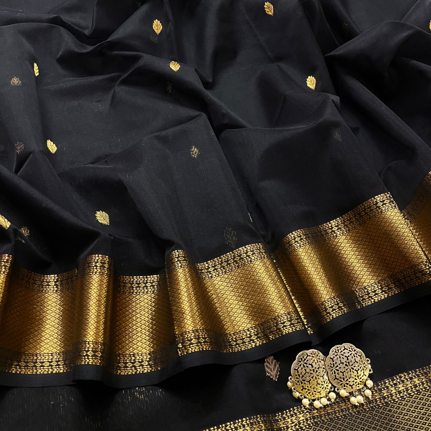 Black maheshwari saree with zari bootis all over