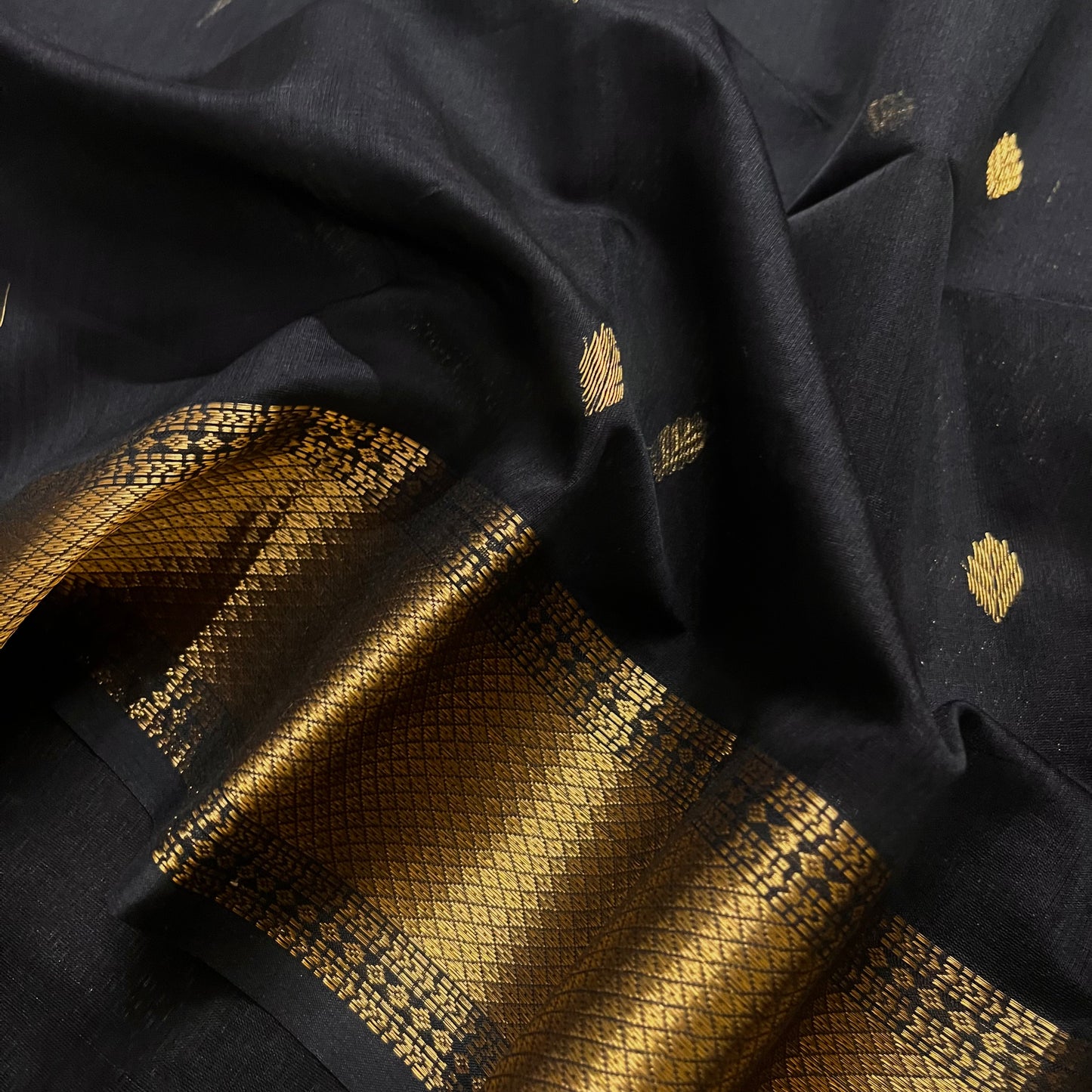 Black maheshwari saree with zari bootis all over