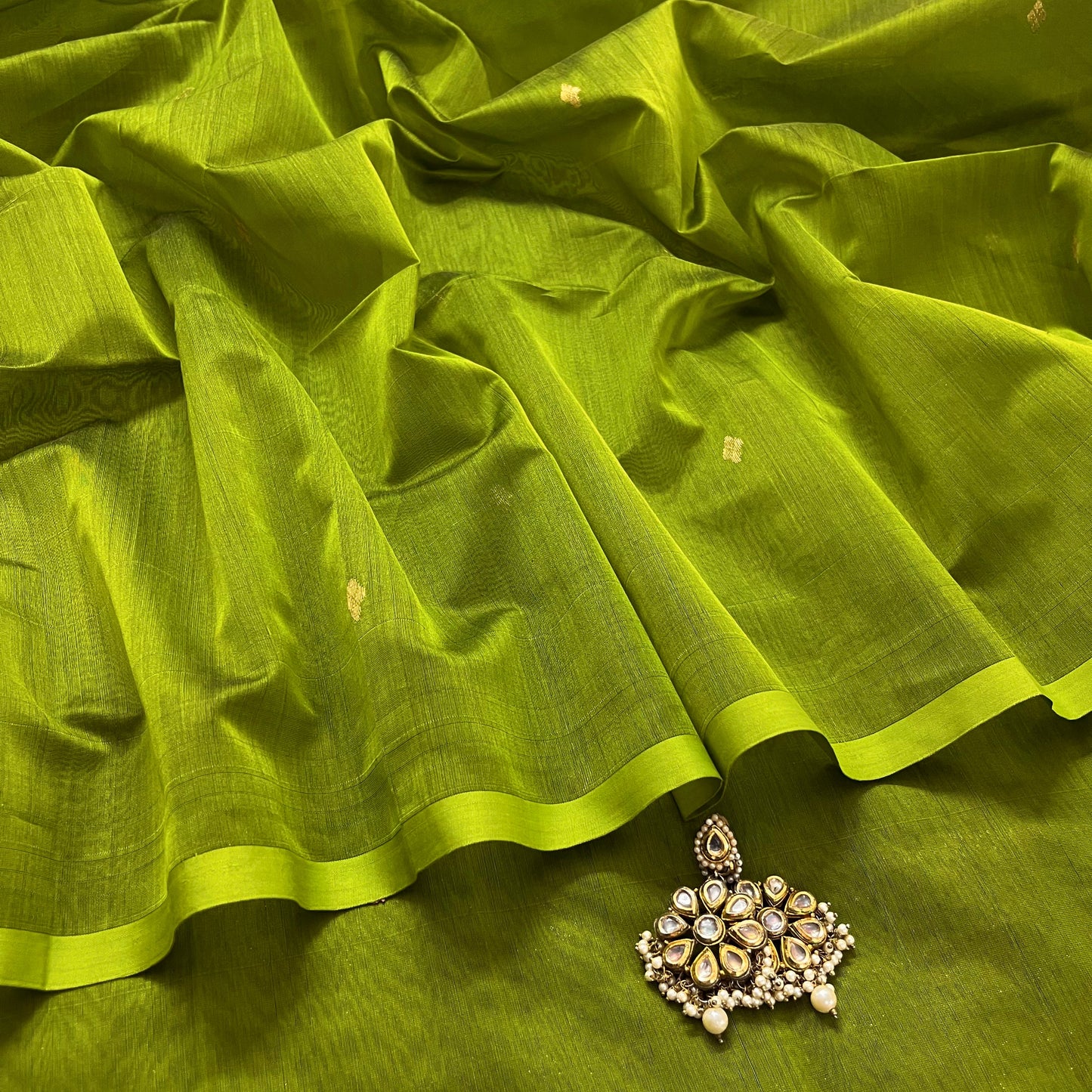 (Shop the look) Olive green maheshwari saree with zari bootis all over