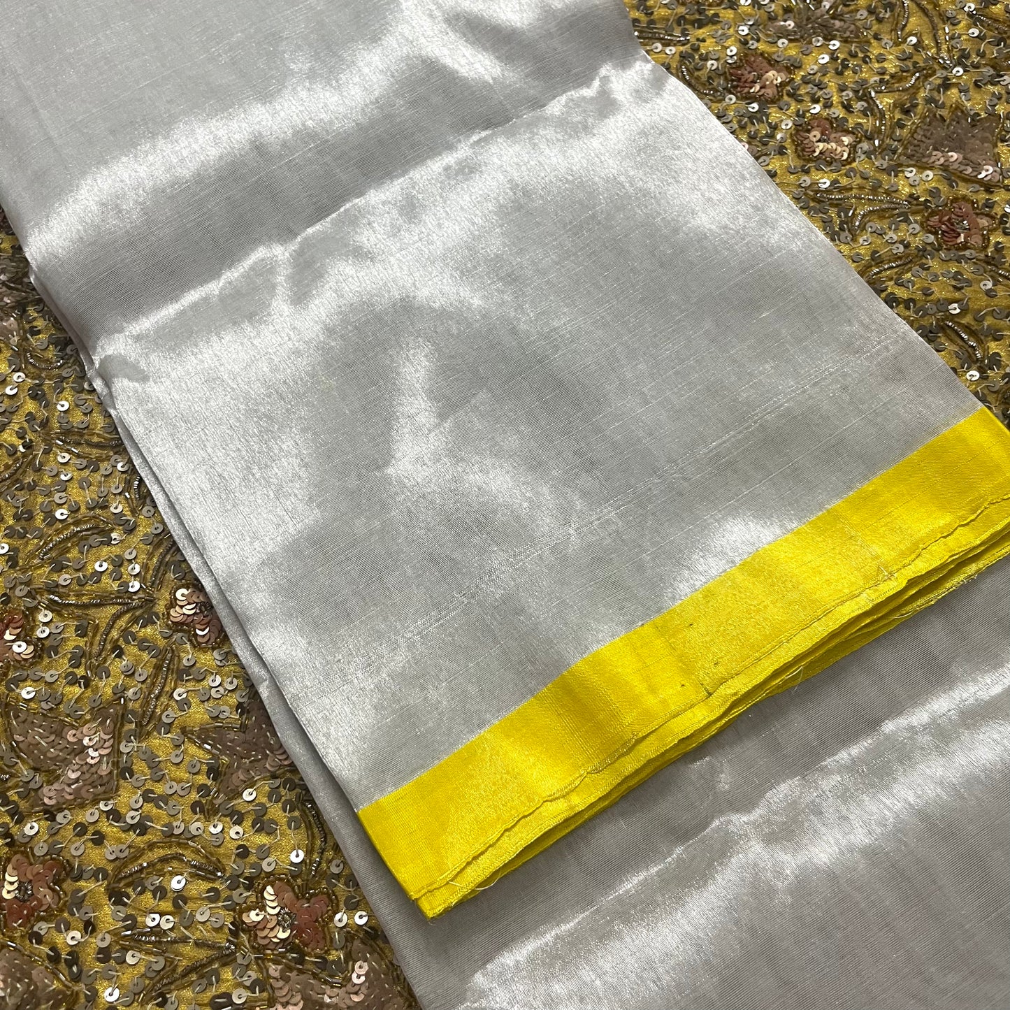 (Shop the look) Silver white and lemon chanderi tissue silk saree