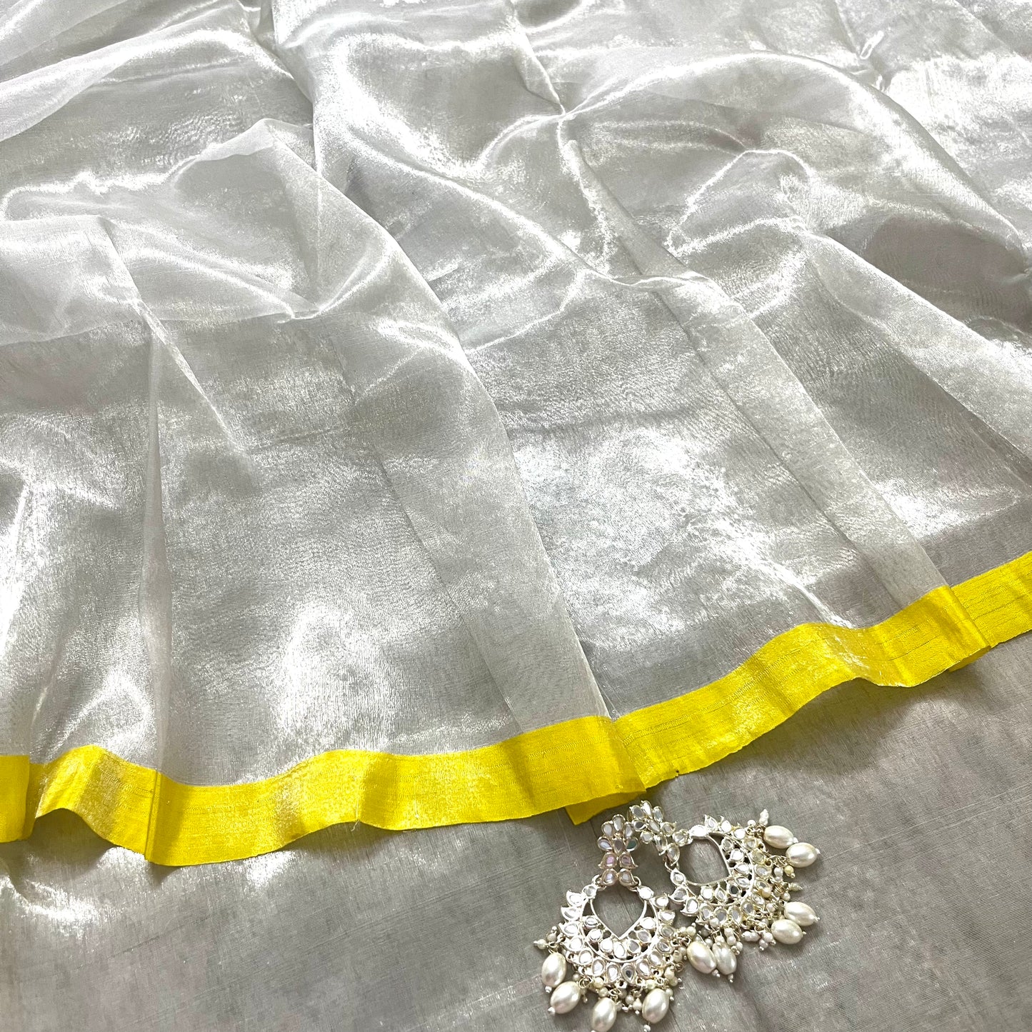 (Shop the look) Silver white and lemon chanderi tissue silk saree