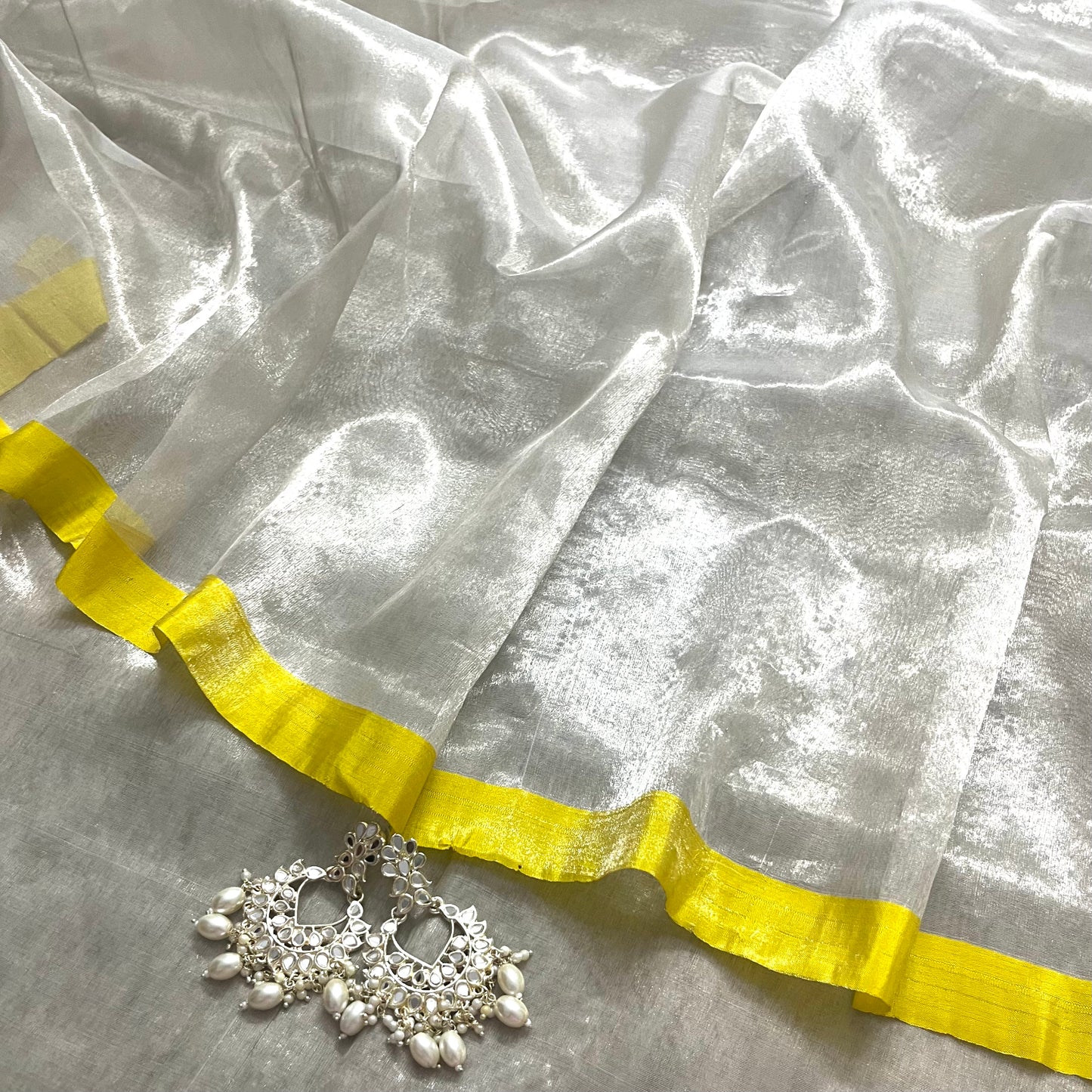 (Shop the look) Silver white and lemon chanderi tissue silk saree