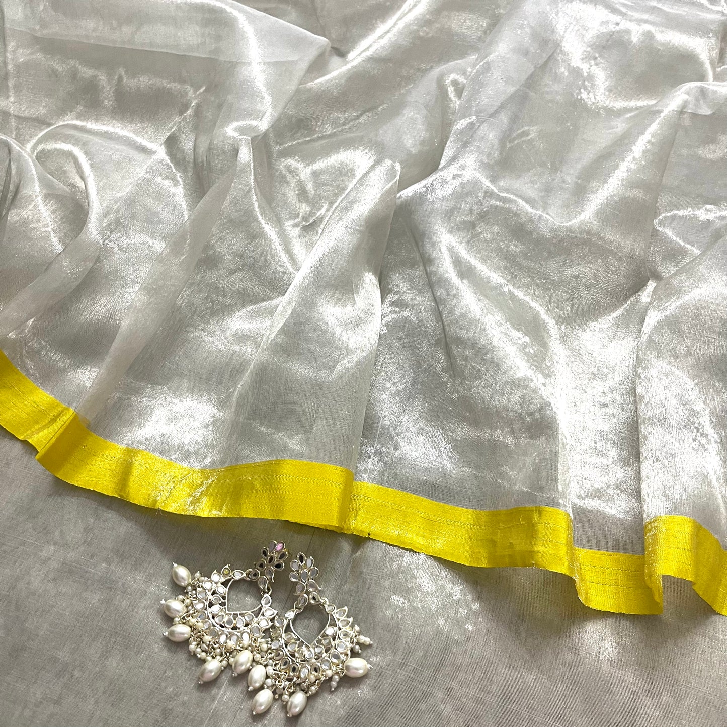 (Shop the look) Silver white and lemon chanderi tissue silk saree